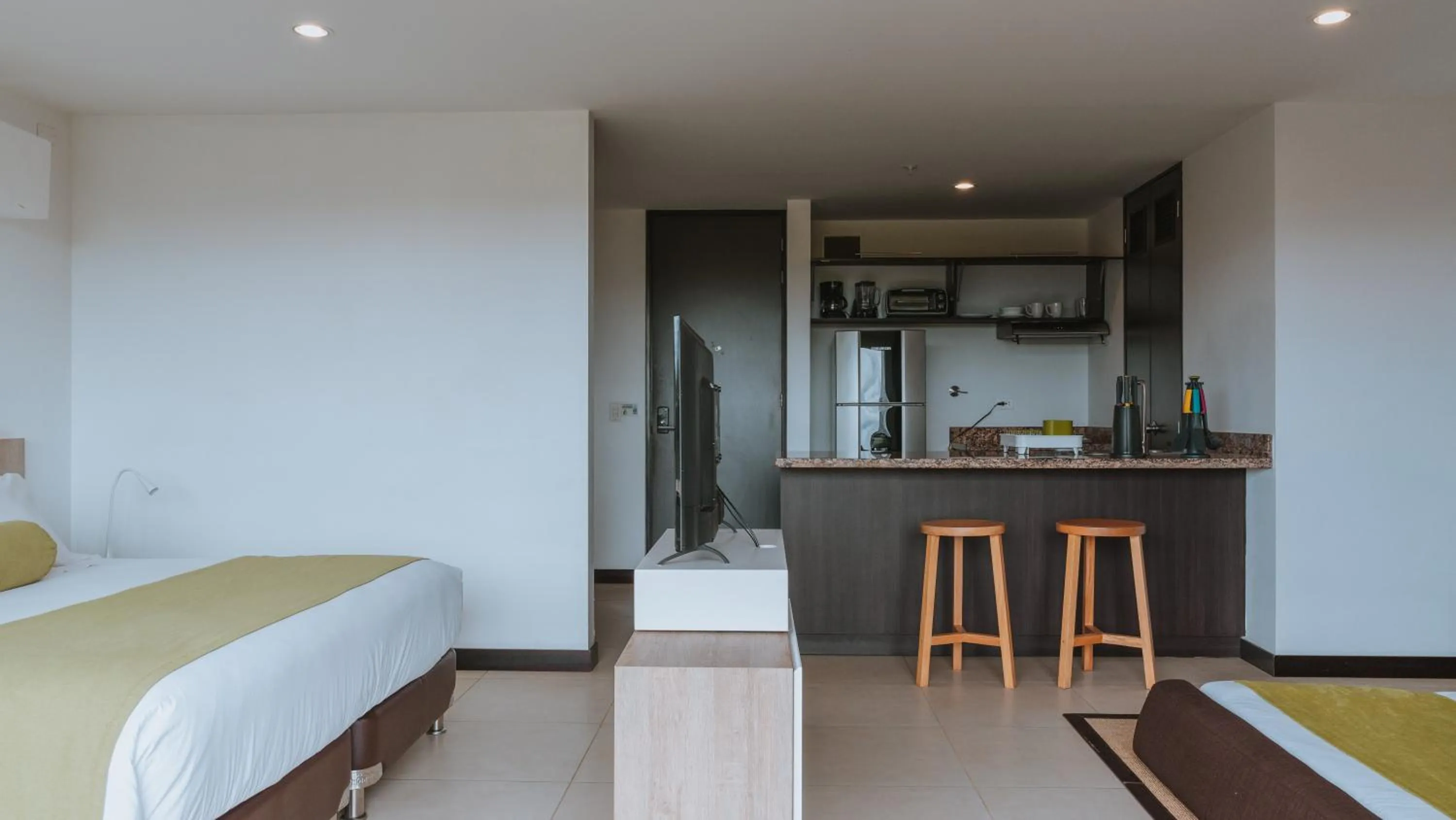 Photo of the whole room, Bed in Travelers Rio Verde Living Suites