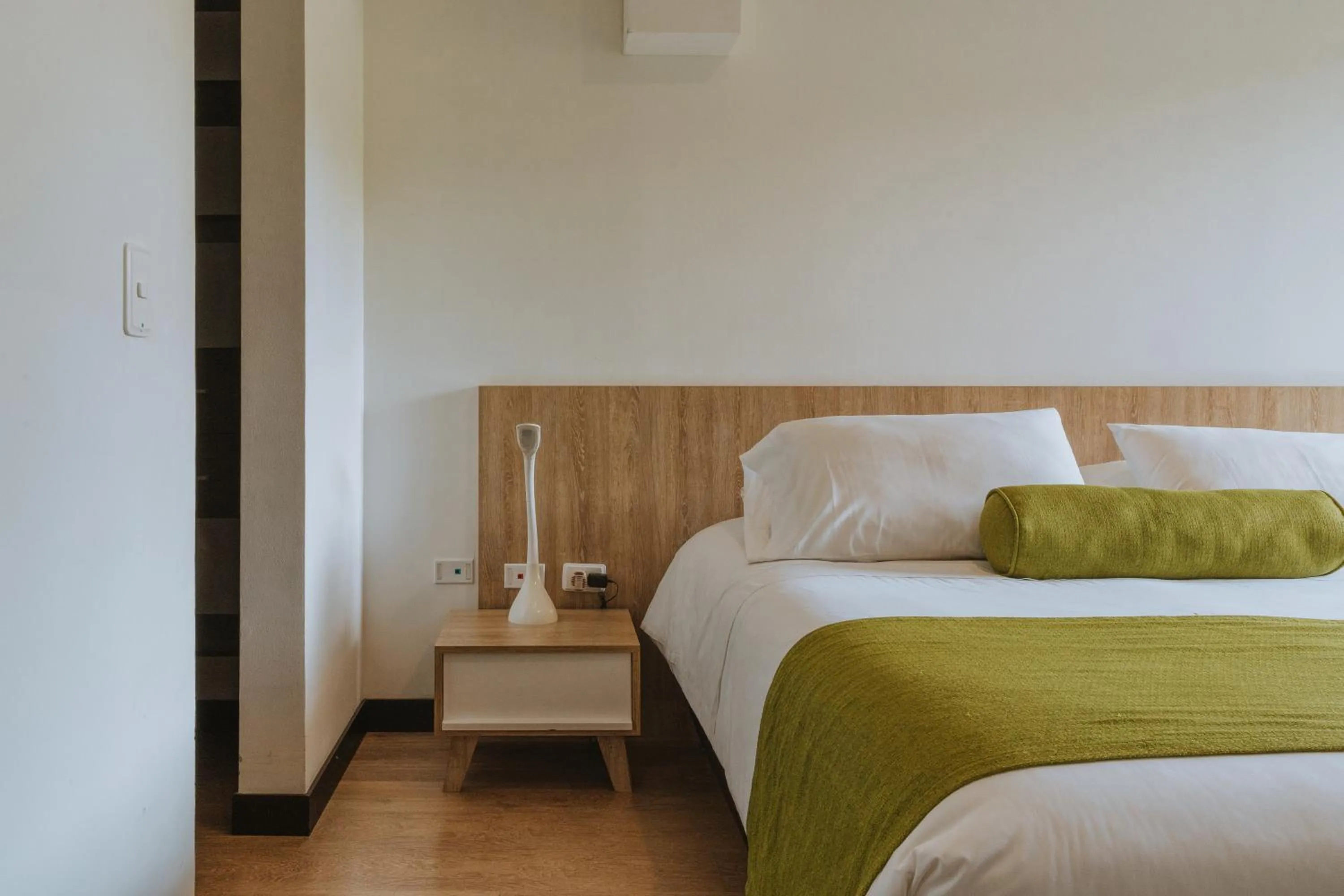 Bed in Travelers Rio Verde Living Suites