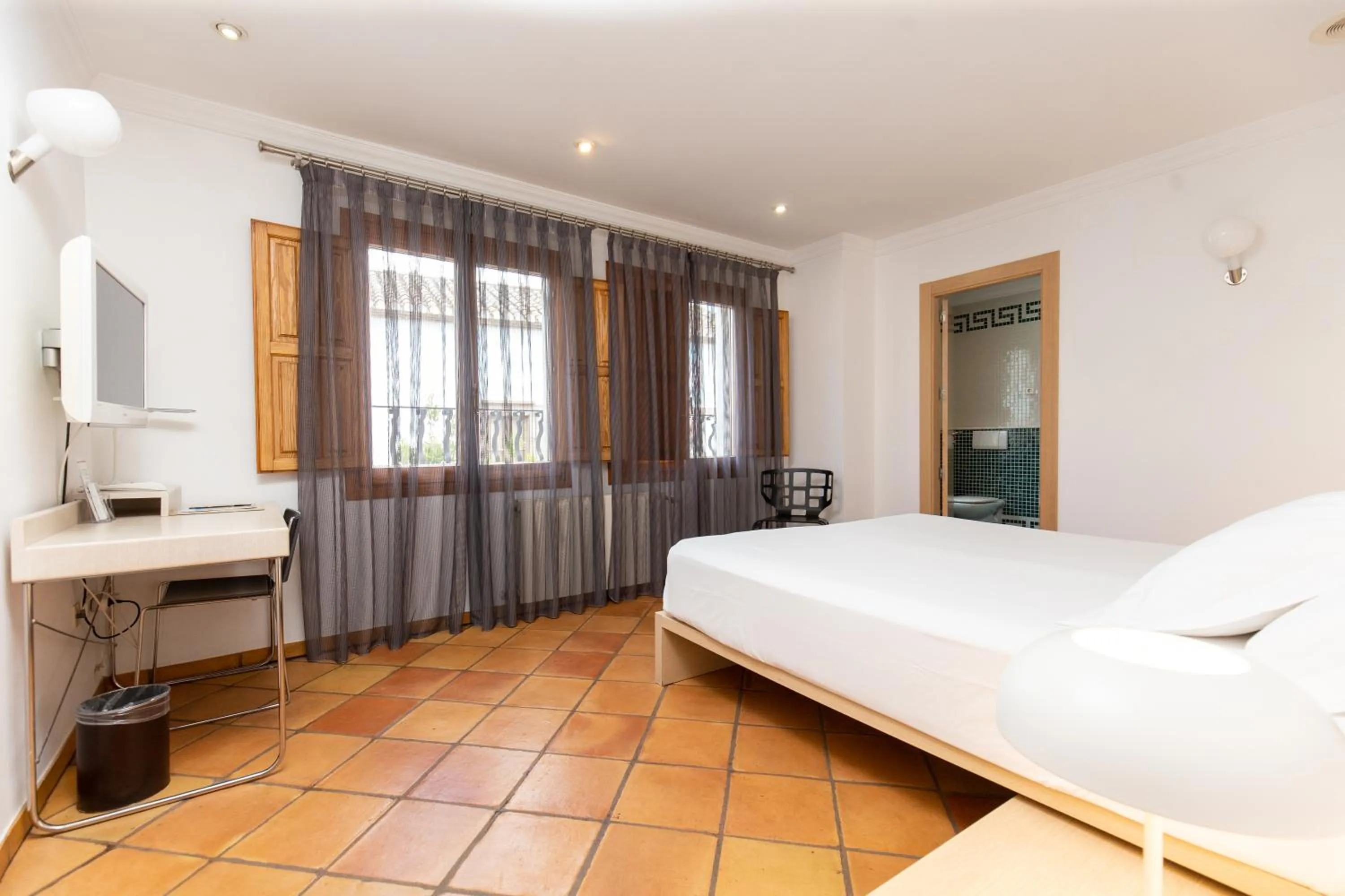 Photo of the whole room, Bed in Hotel Nou Romà