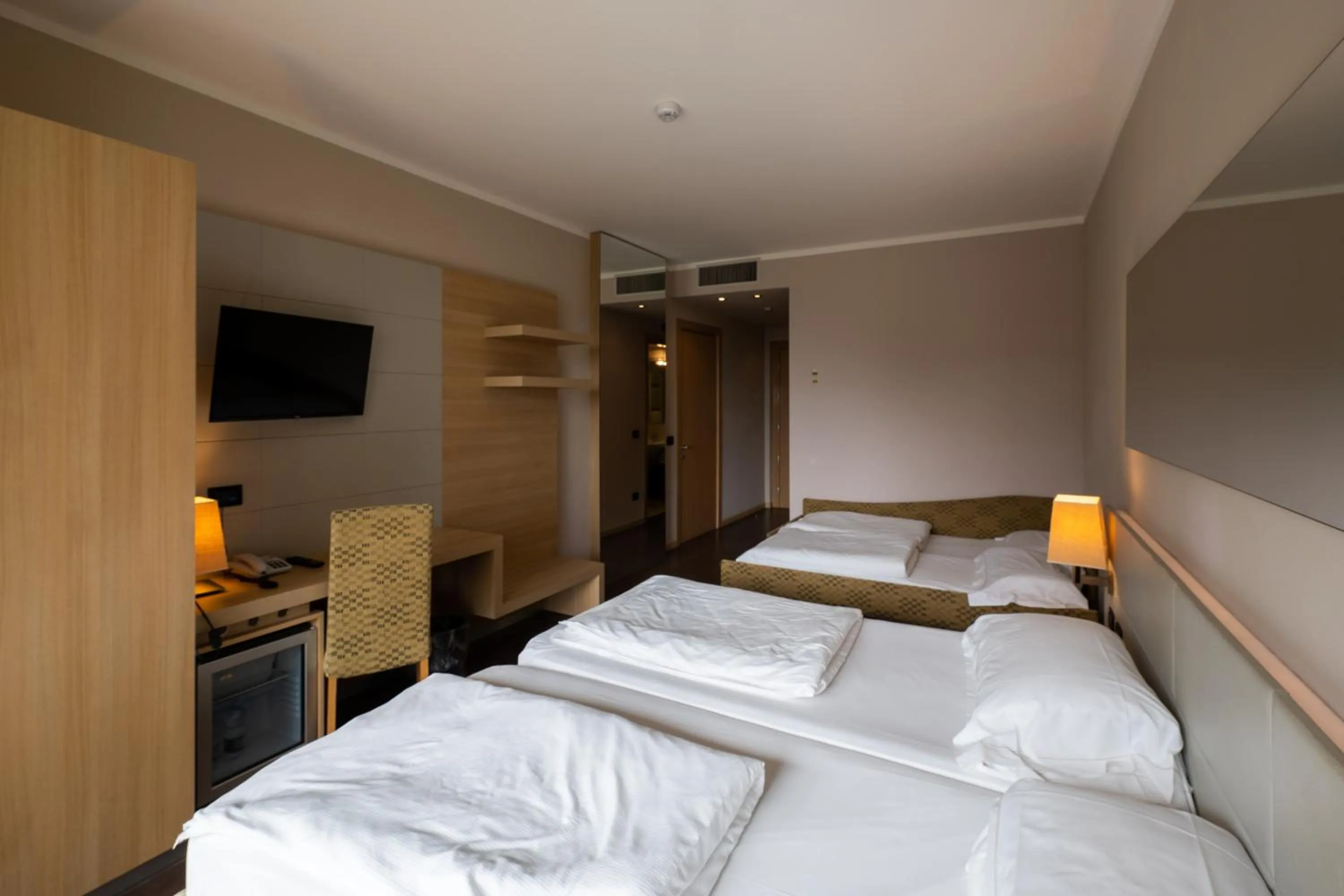 Bed in Villa Luisa Resort & Luxury Apartments