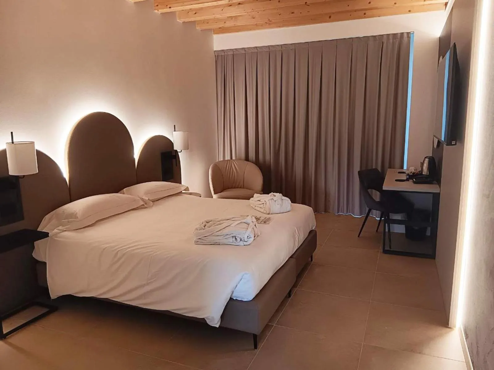 Bed in Villa Luisa Resort & Luxury Apartments