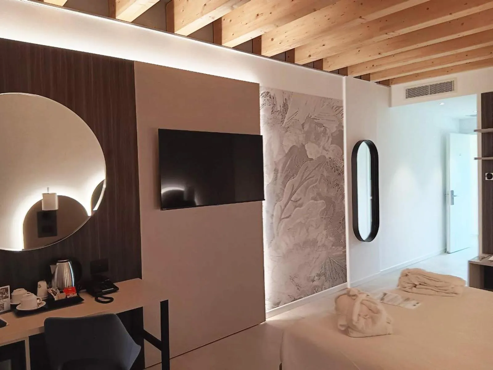 Bed in Villa Luisa Resort & Luxury Apartments