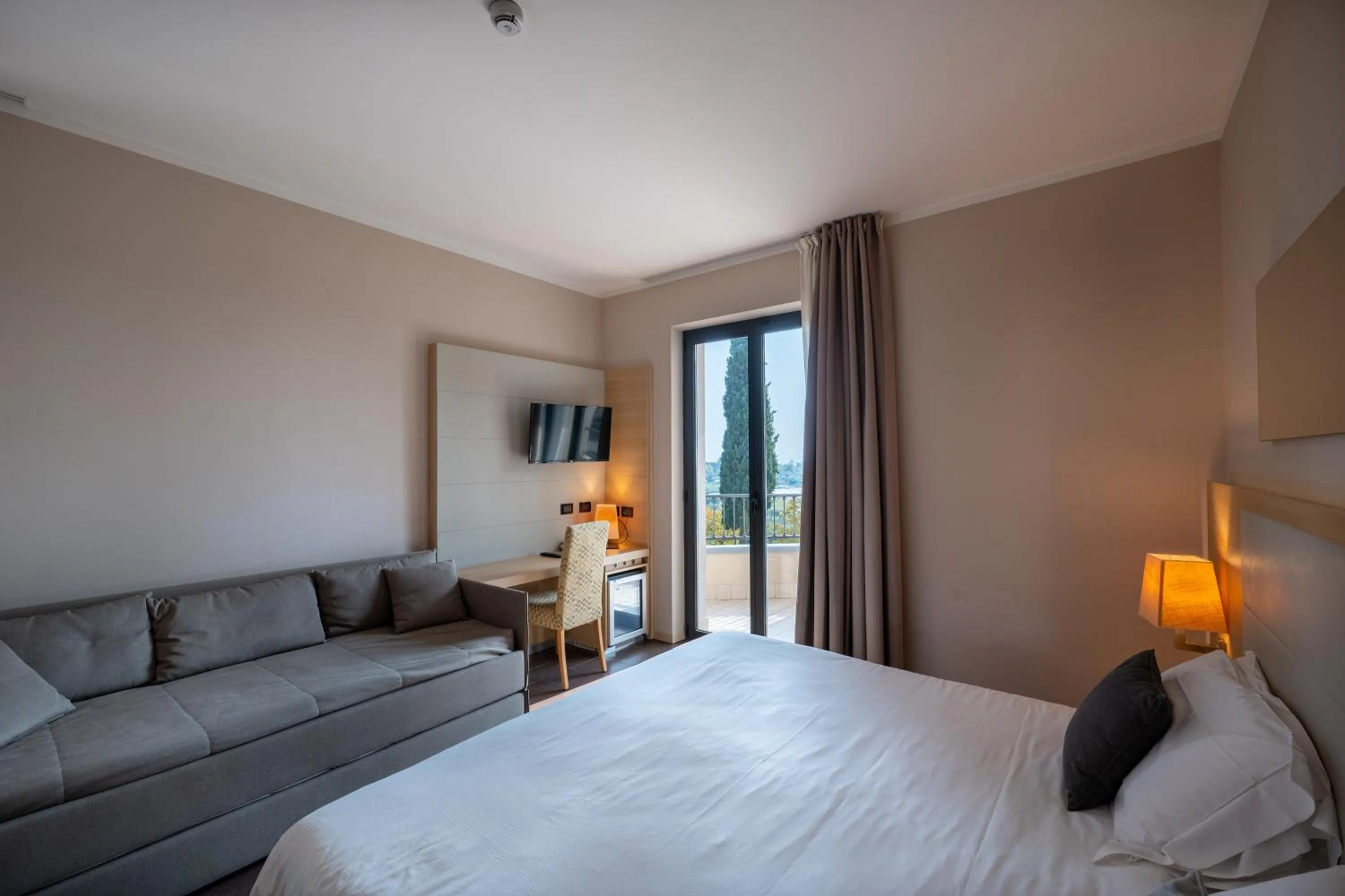 Bed in Villa Luisa Resort & Luxury Apartments