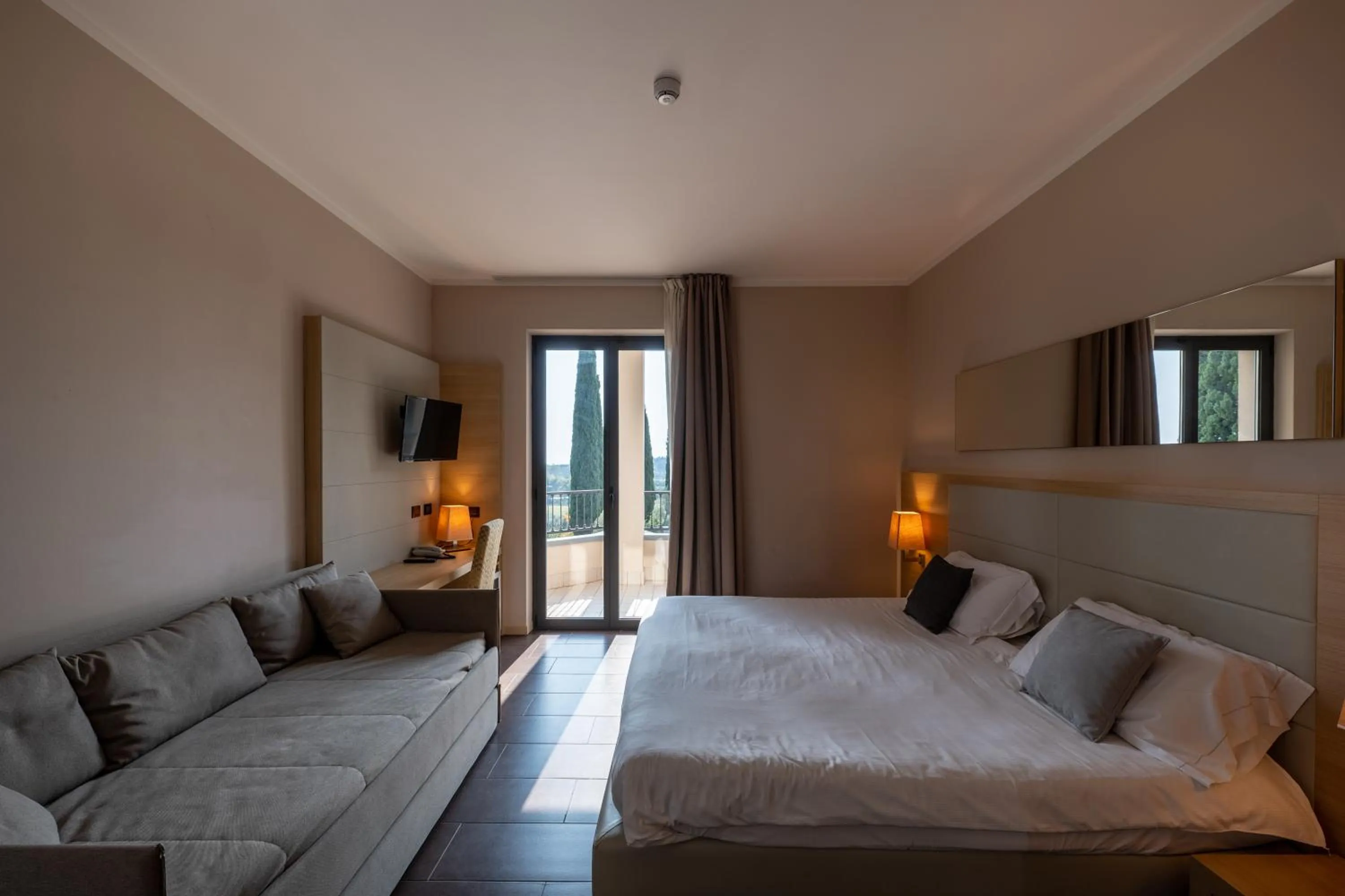 Bed in Villa Luisa Resort & Luxury Apartments