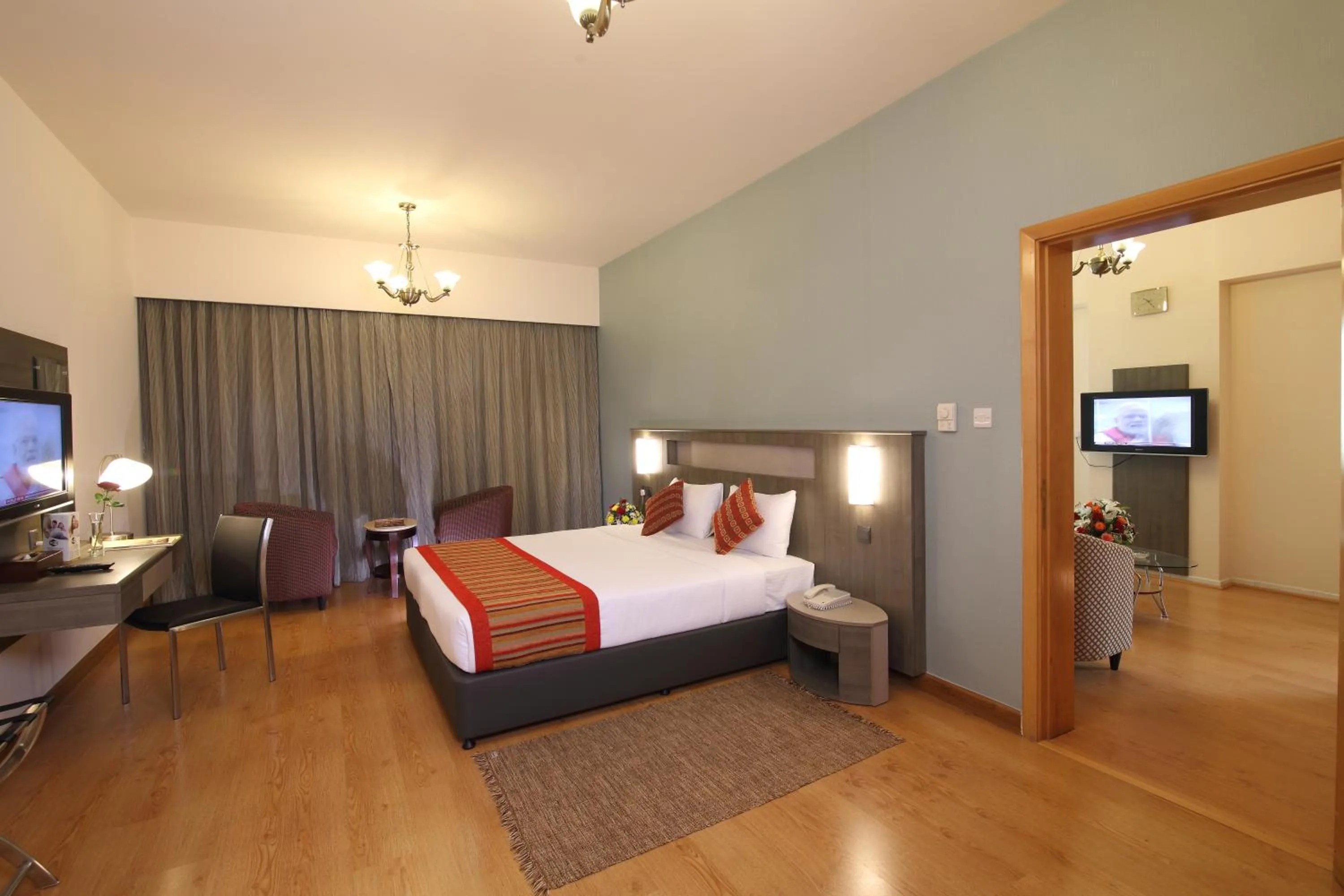 Living room, Bed in Florida City Hotel Apartments (Previously Flora Hotel Apartments)