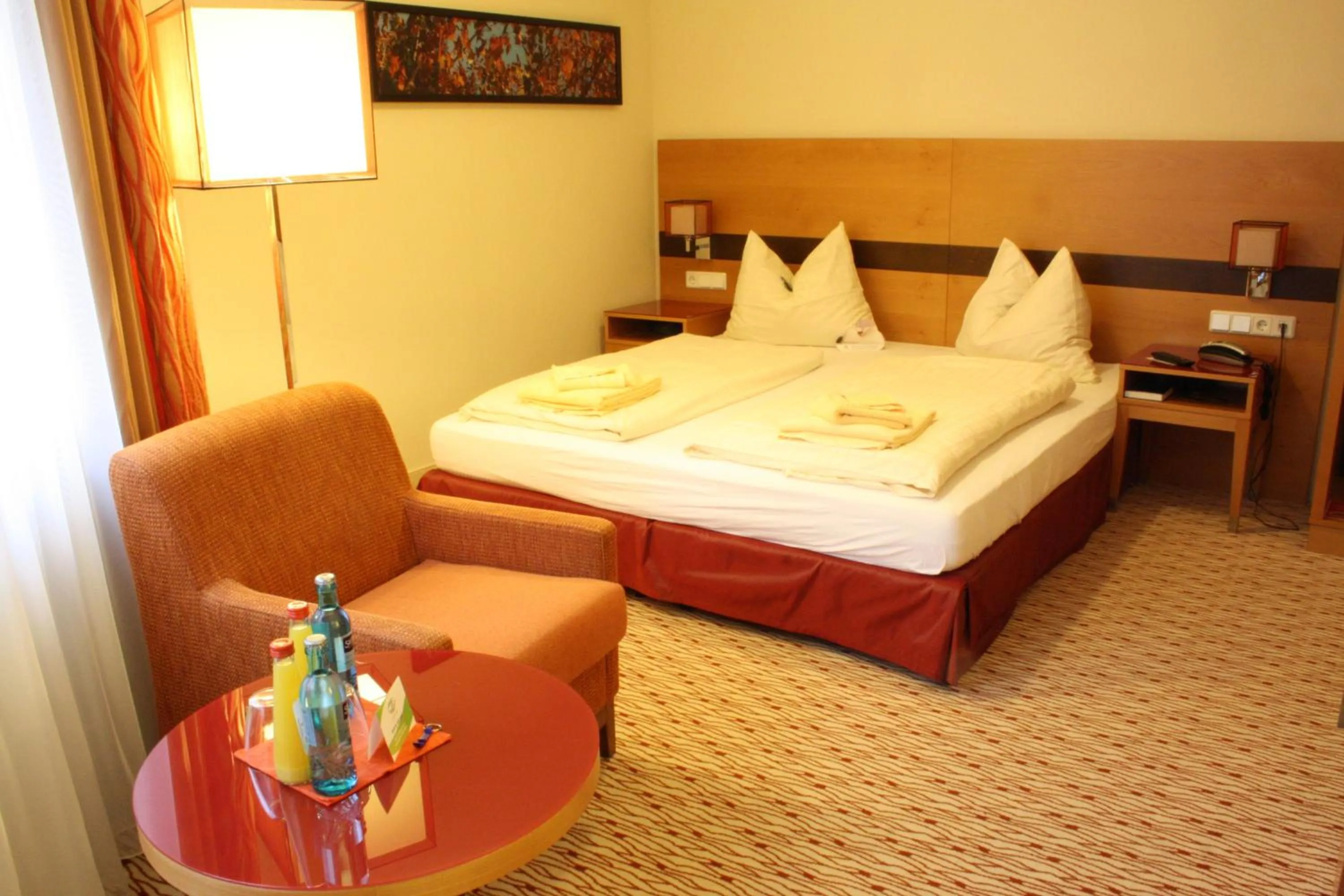 Photo of the whole room, Bed in TaunusTagungsHotel