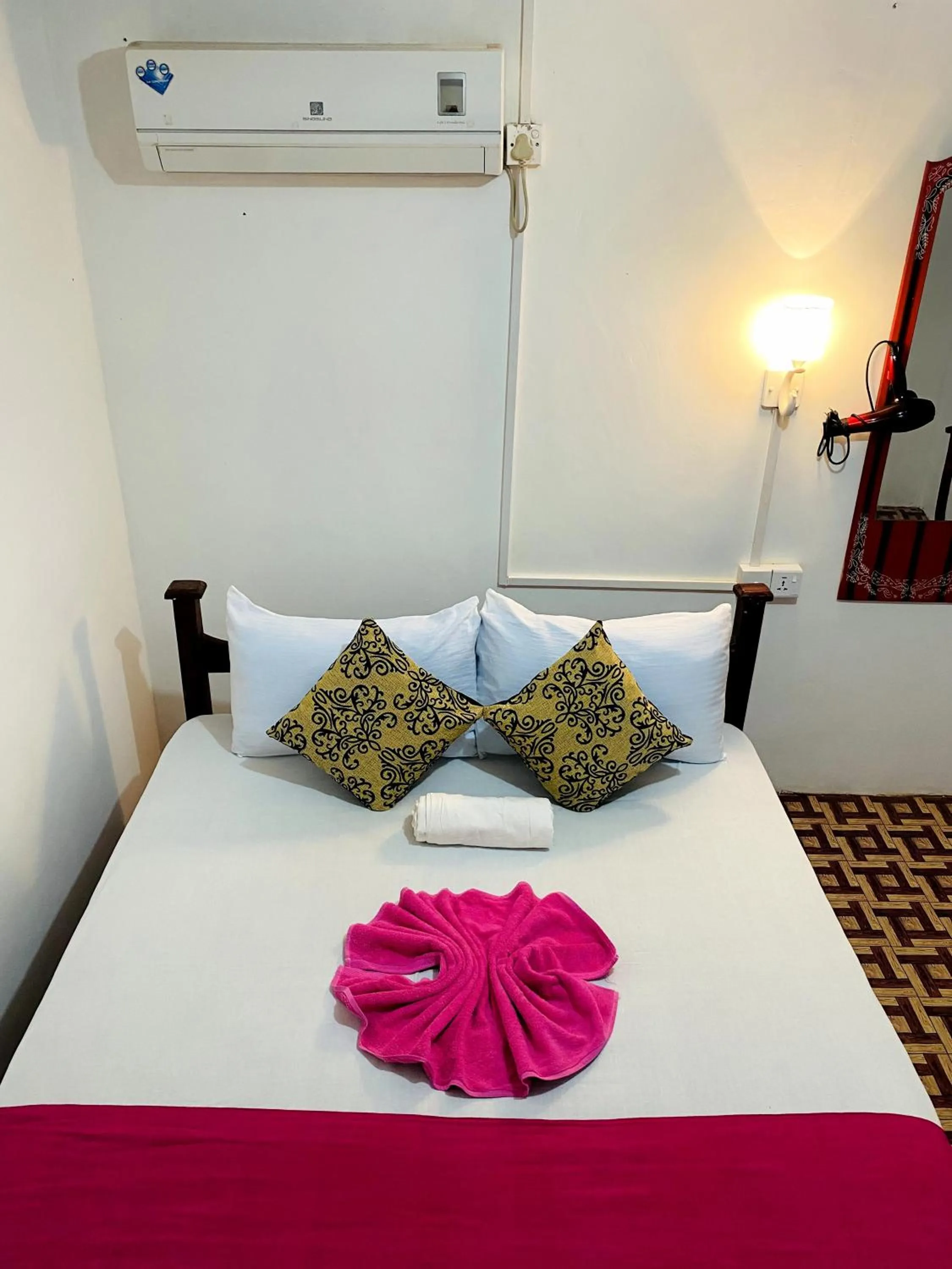 Bed in Sigiri Lakshan Home Stay