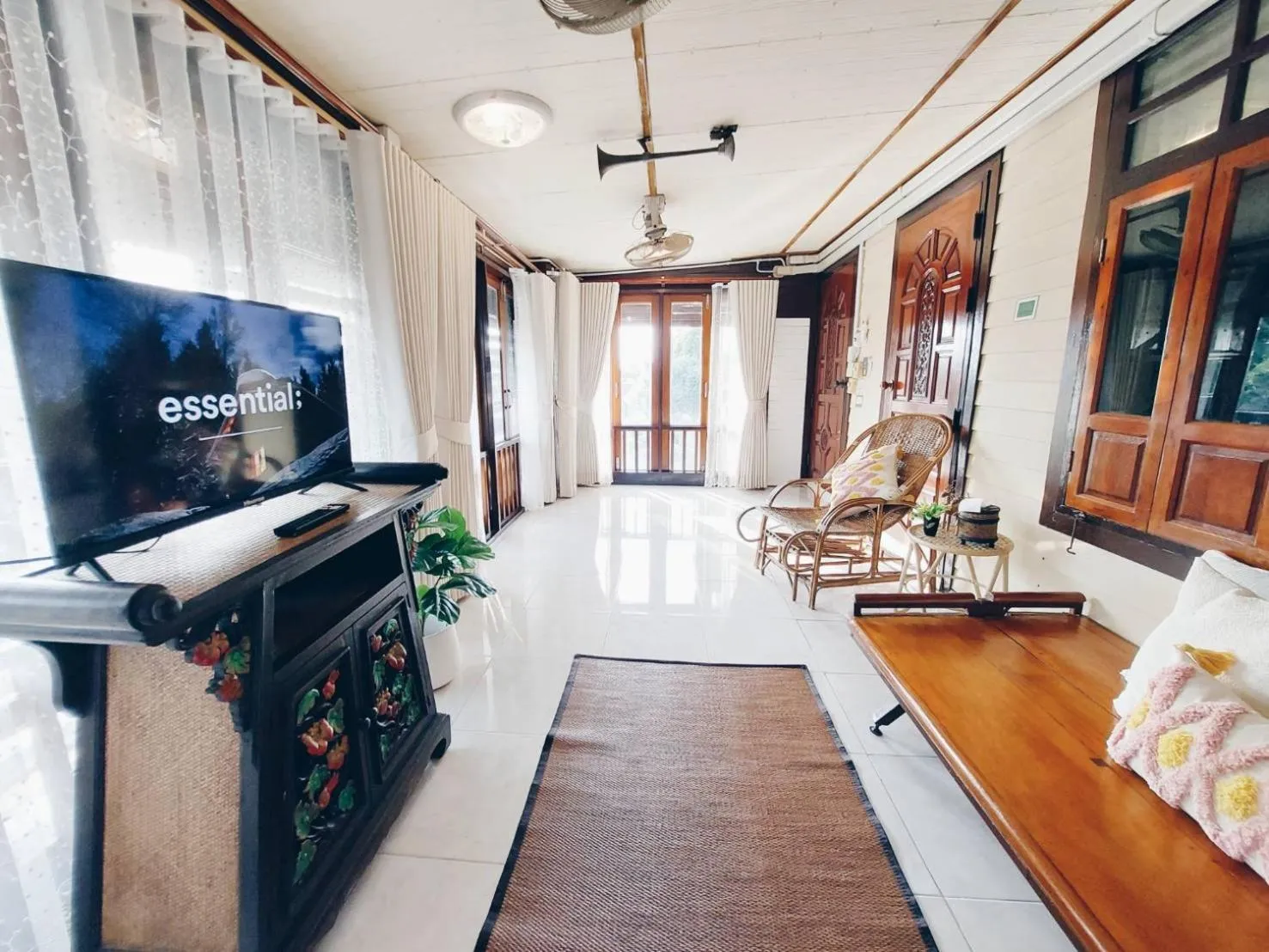 Communal lounge/ TV room in Green Riverside Homestay