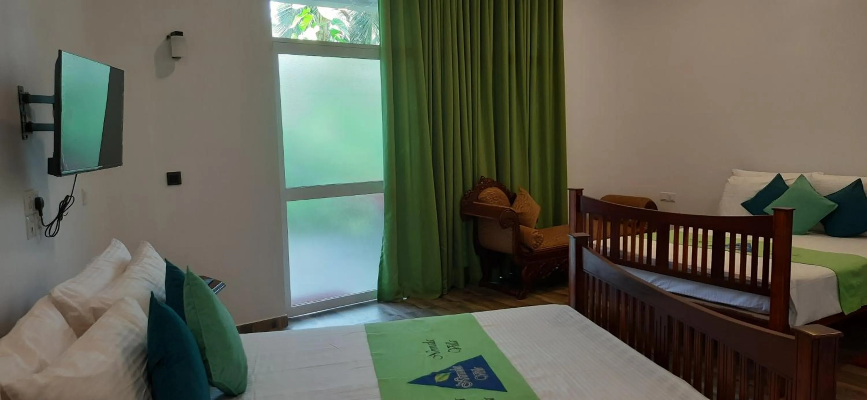 Bed in Nirmala Villa