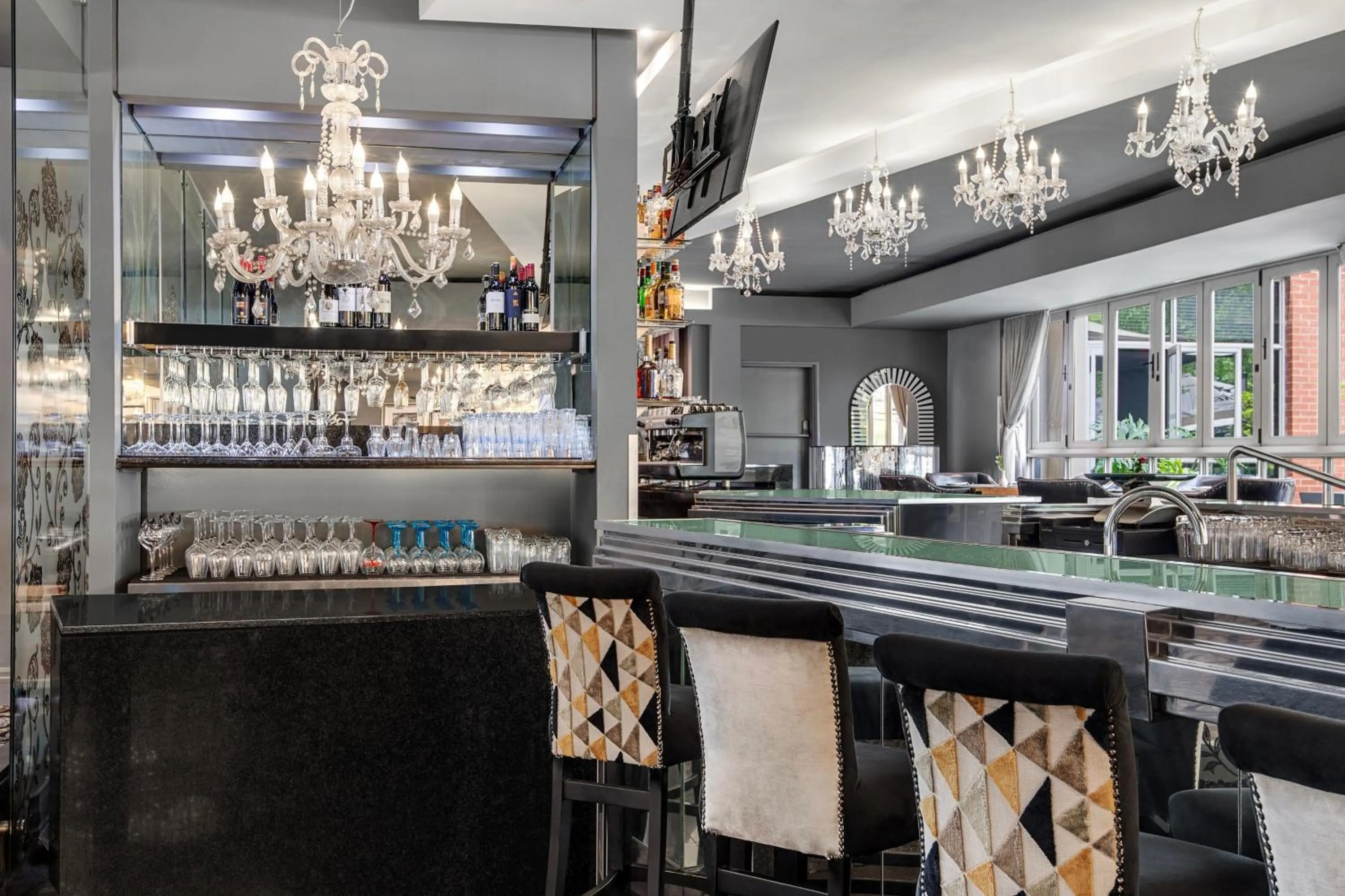 Lounge or bar in Protea Hotel Fire & Ice! by Marriott Johannesburg Melrose Arch