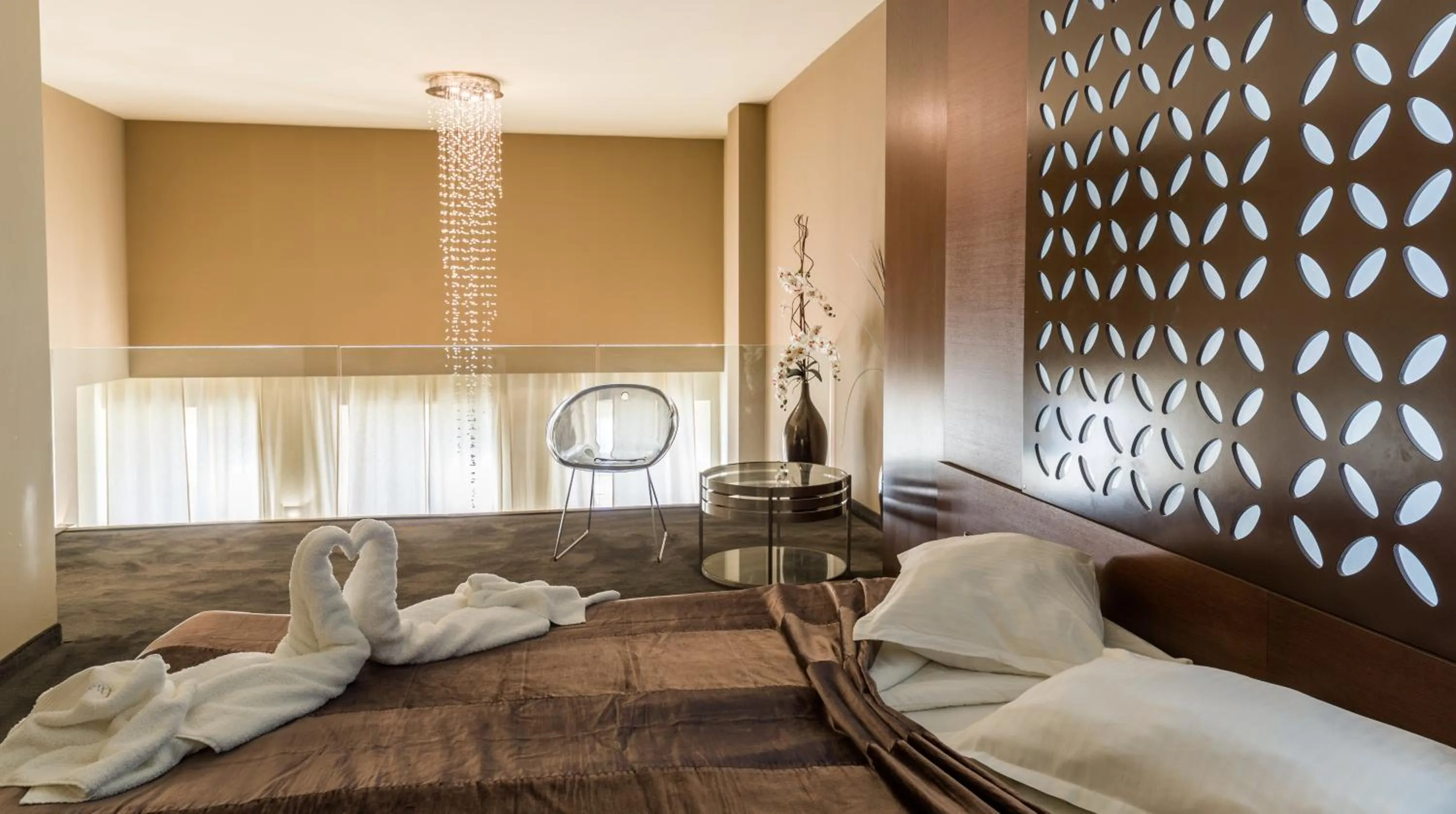 Bed in Cosmopolitan Hotel & Wellness