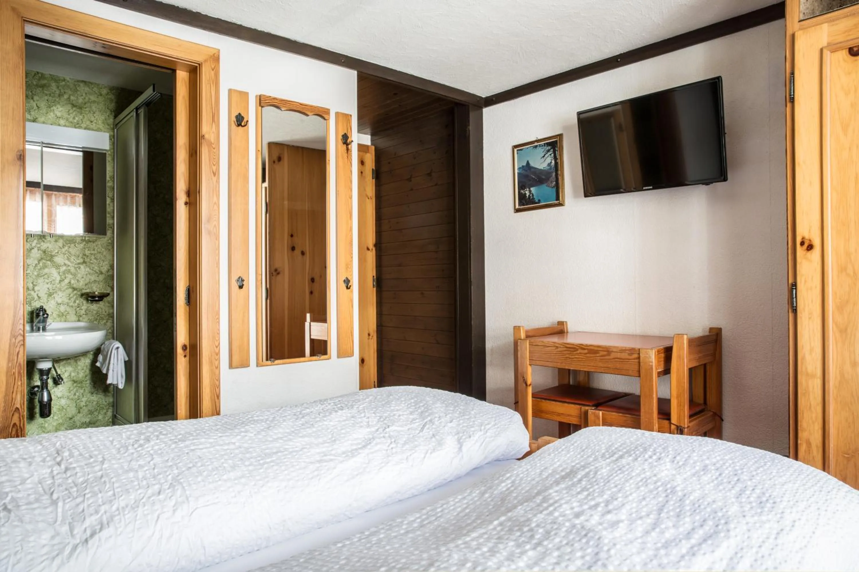 Bedroom, Bed in Hotel Burgener