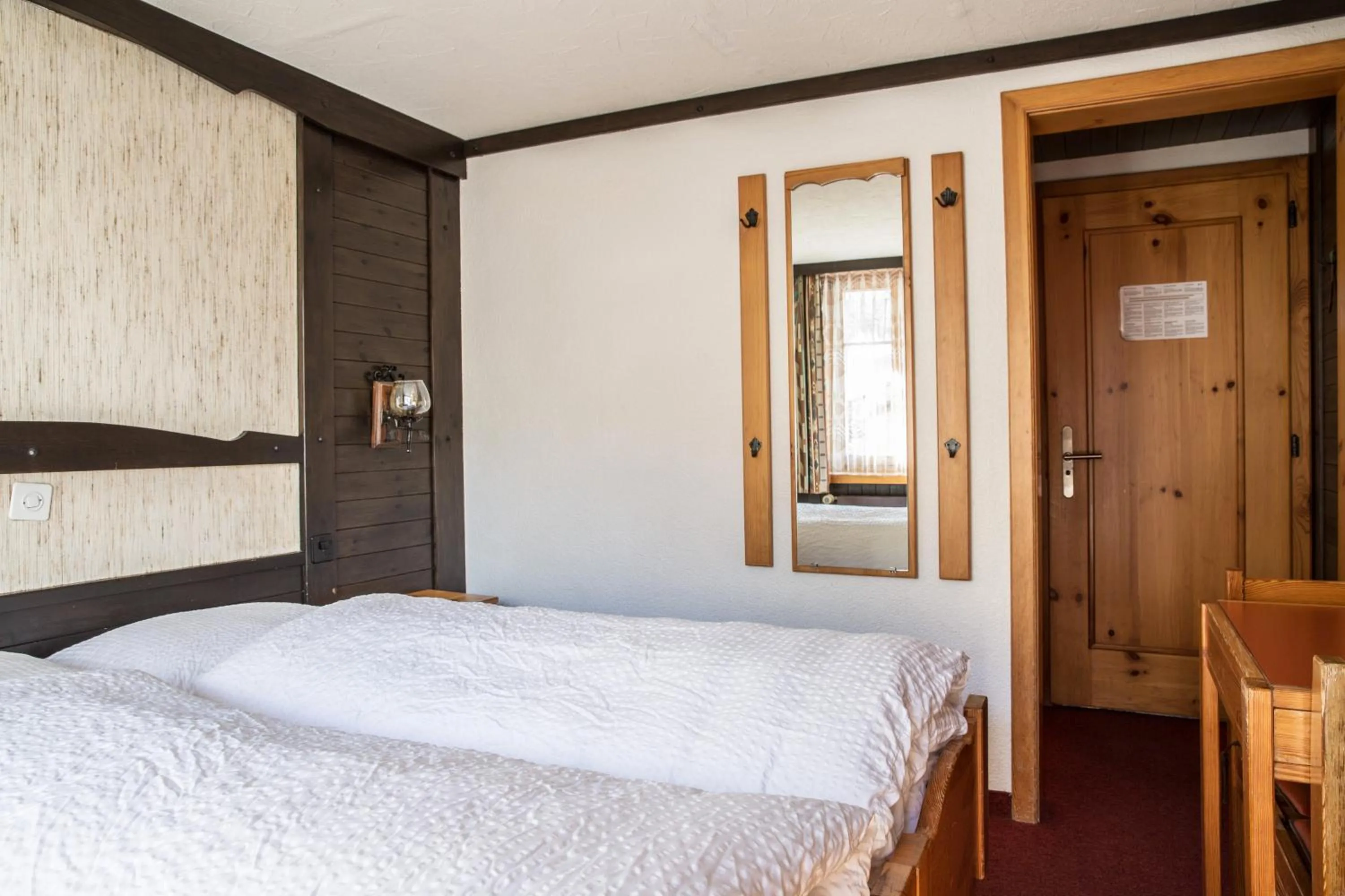 Bedroom, Bed in Hotel Burgener