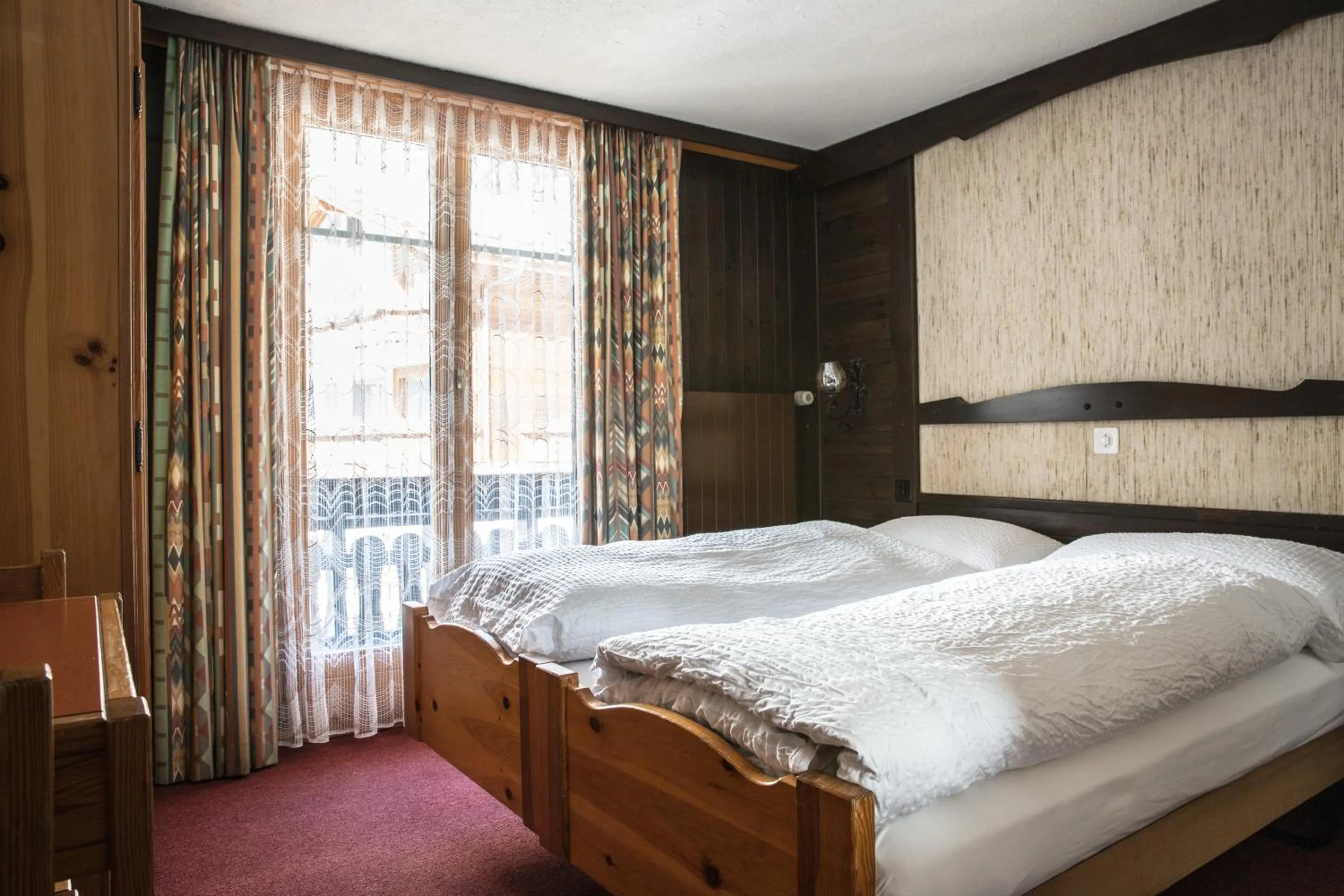 Bedroom, Bed in Hotel Burgener