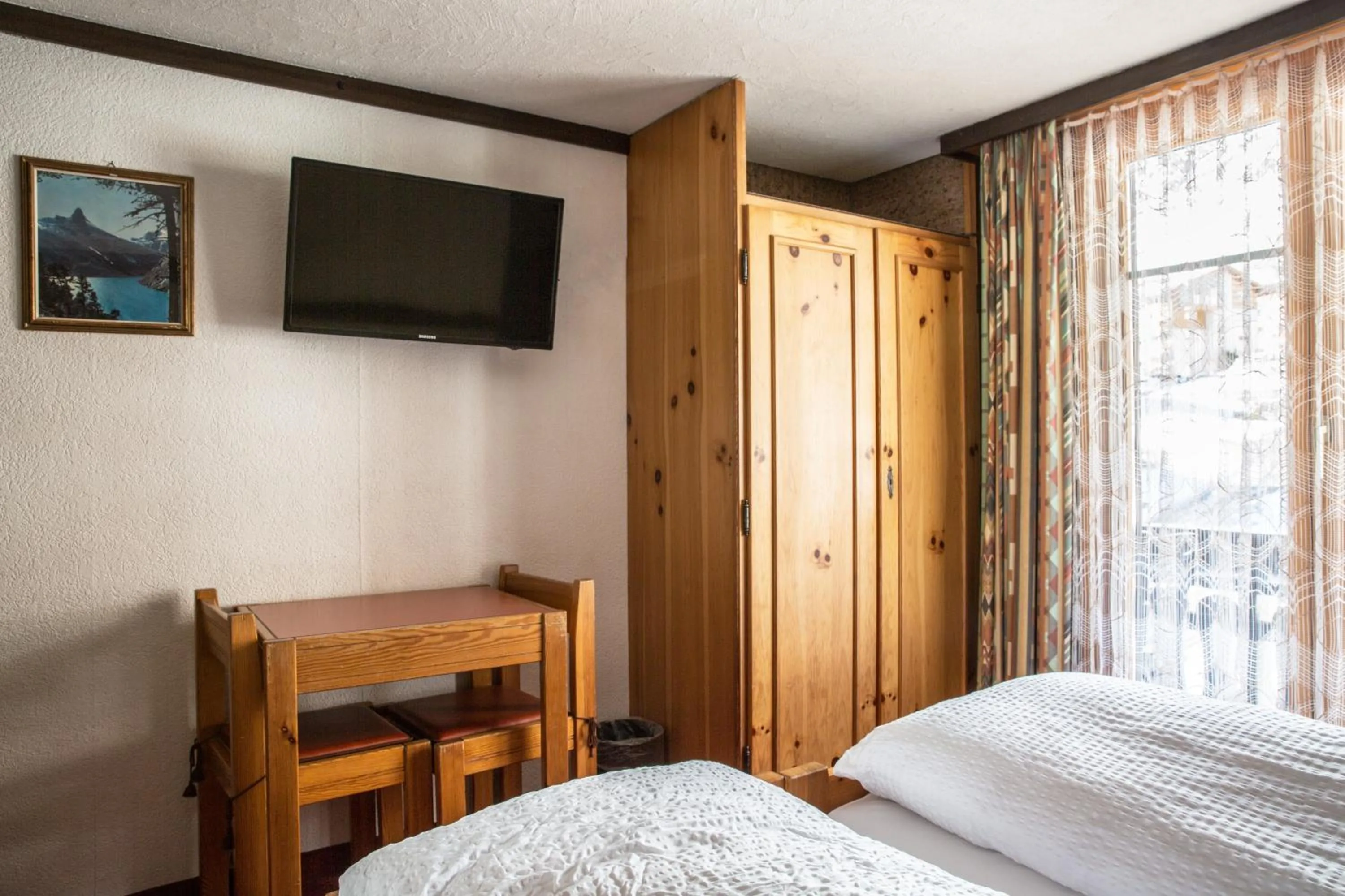 Bedroom, Bed in Hotel Burgener