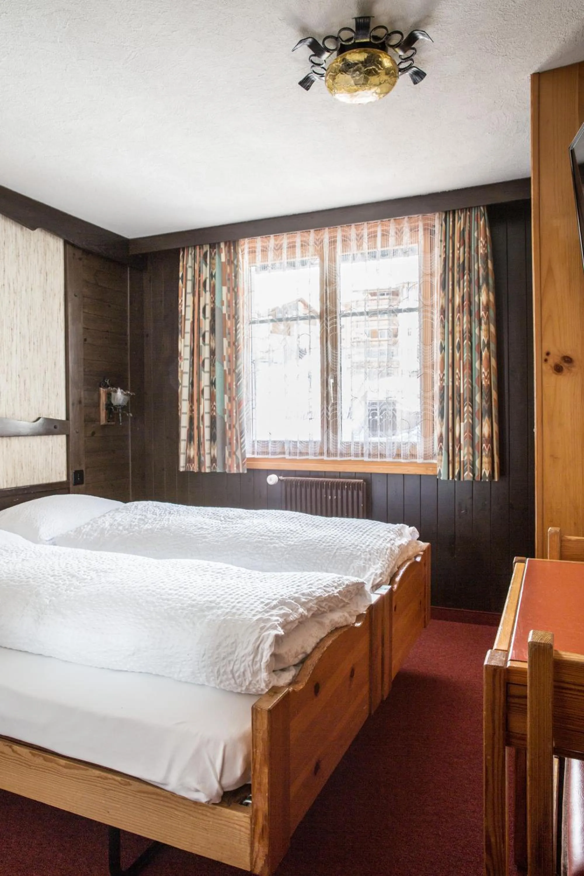 Bedroom, Bed in Hotel Burgener