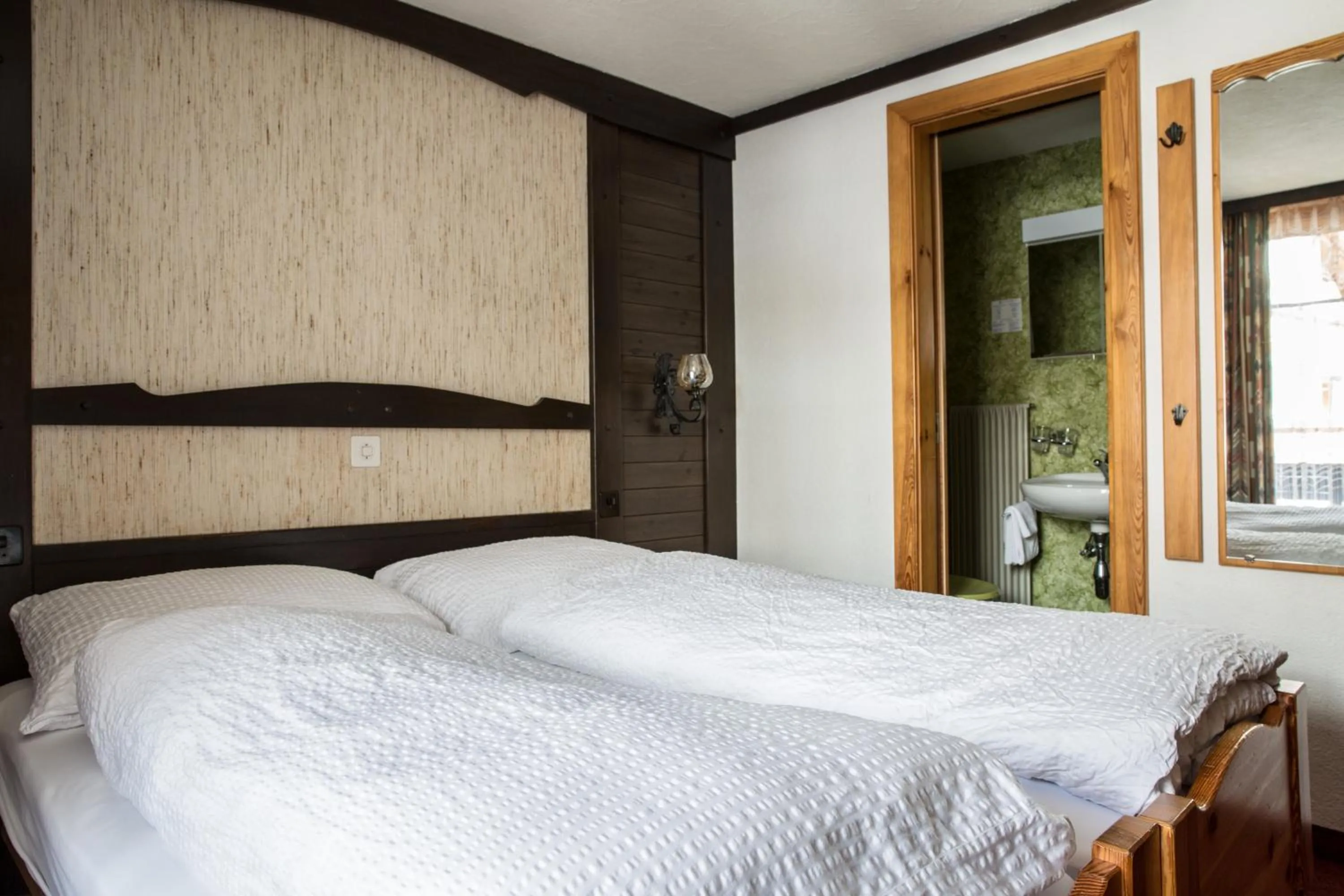 Bedroom, Bed in Hotel Burgener