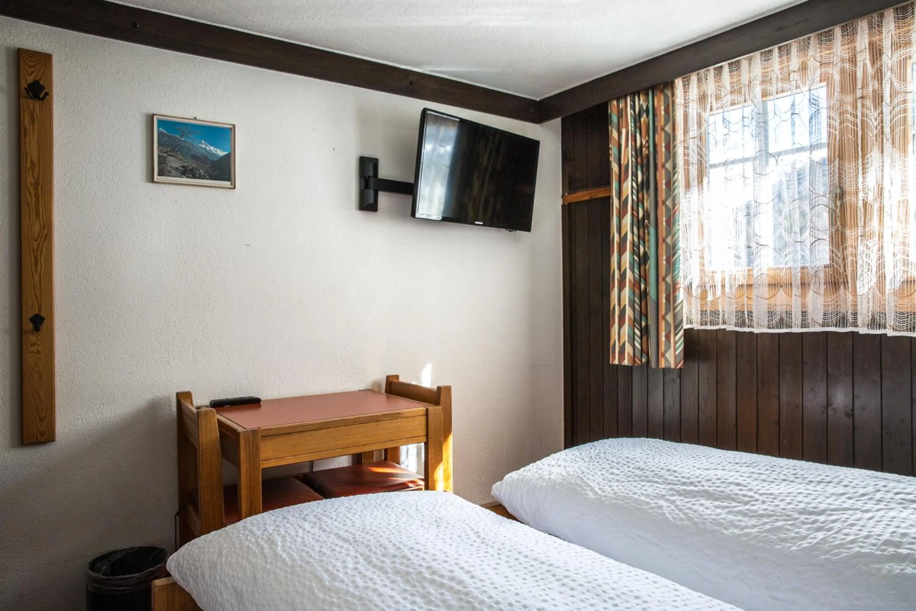 Bedroom, Bed in Hotel Burgener