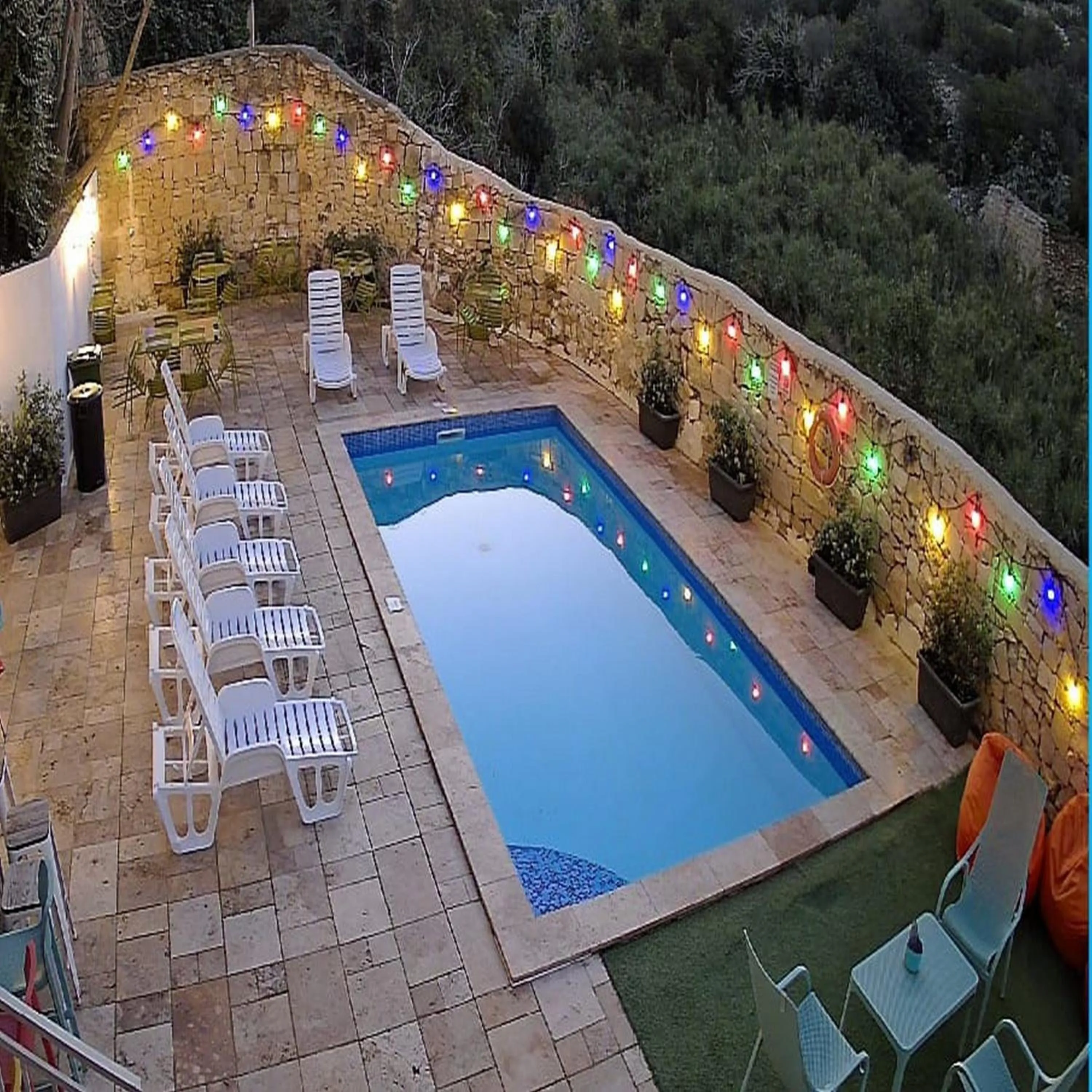 Pool view in Follow the Sun Boutique Hostel - Pool, Breakfast & Sea Views