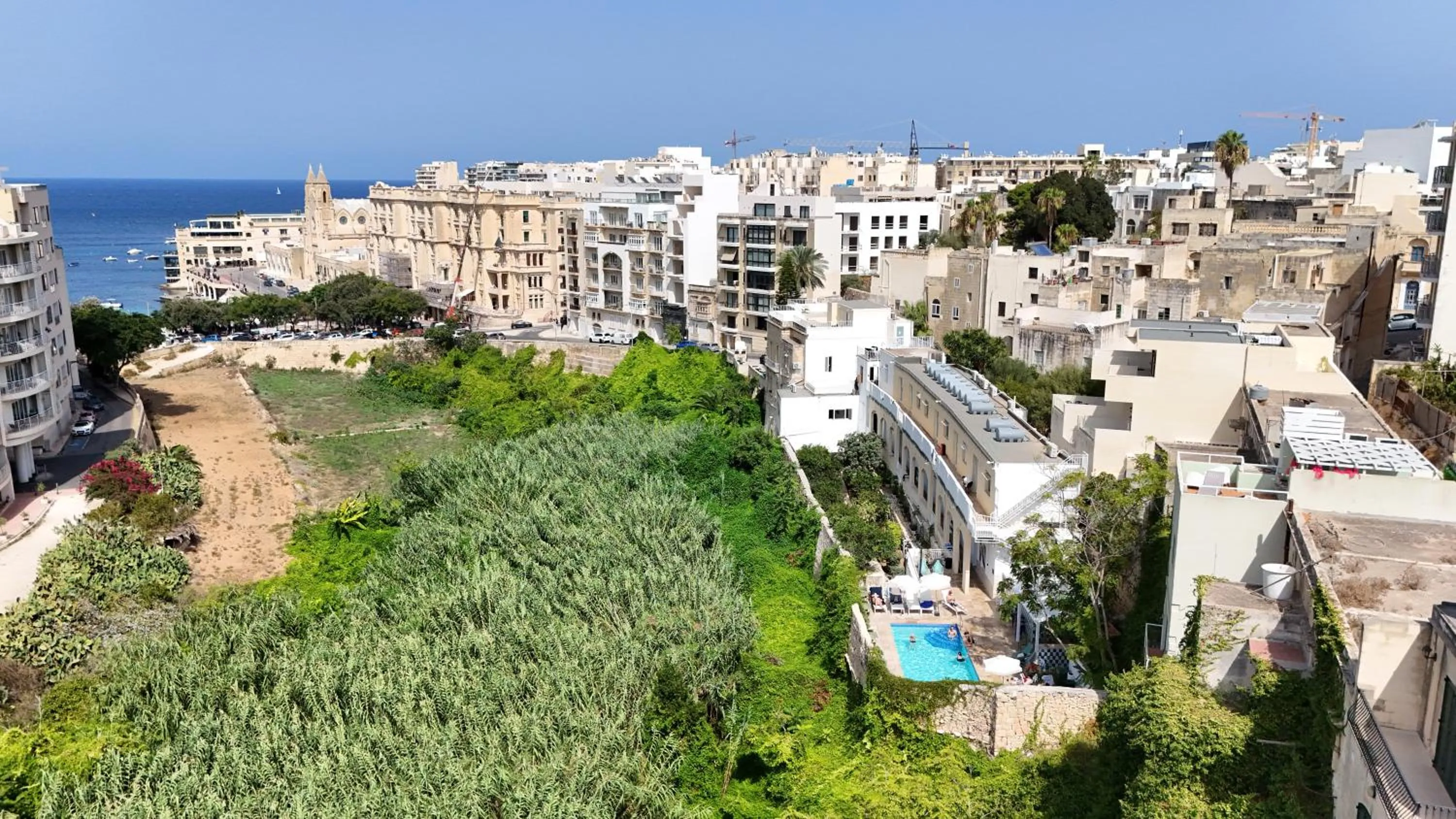 Property building in Follow the Sun Boutique Hostel - Pool, Breakfast & Sea Views