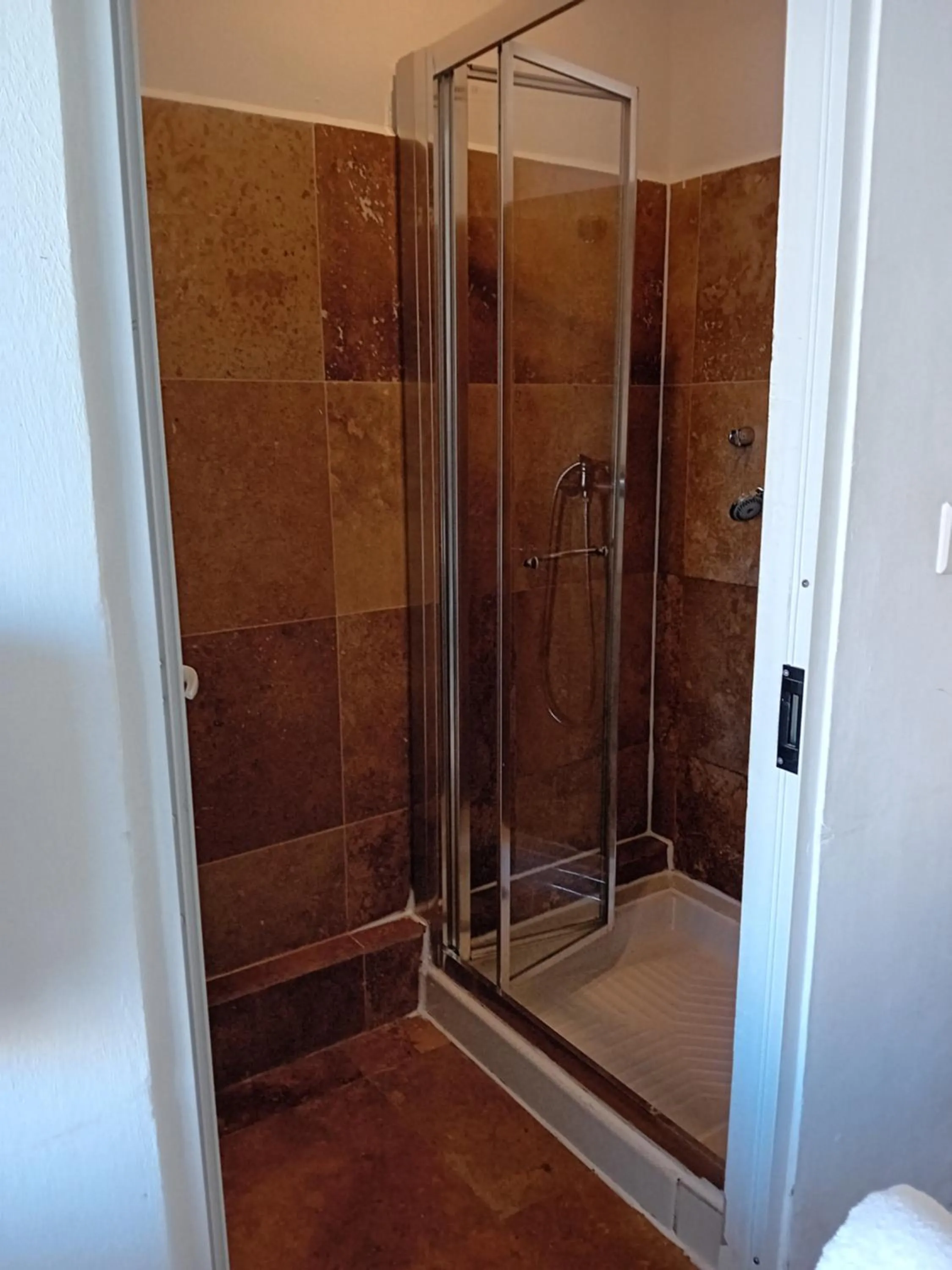 Shower in Follow the Sun Boutique Hostel - Pool, Breakfast & Sea Views