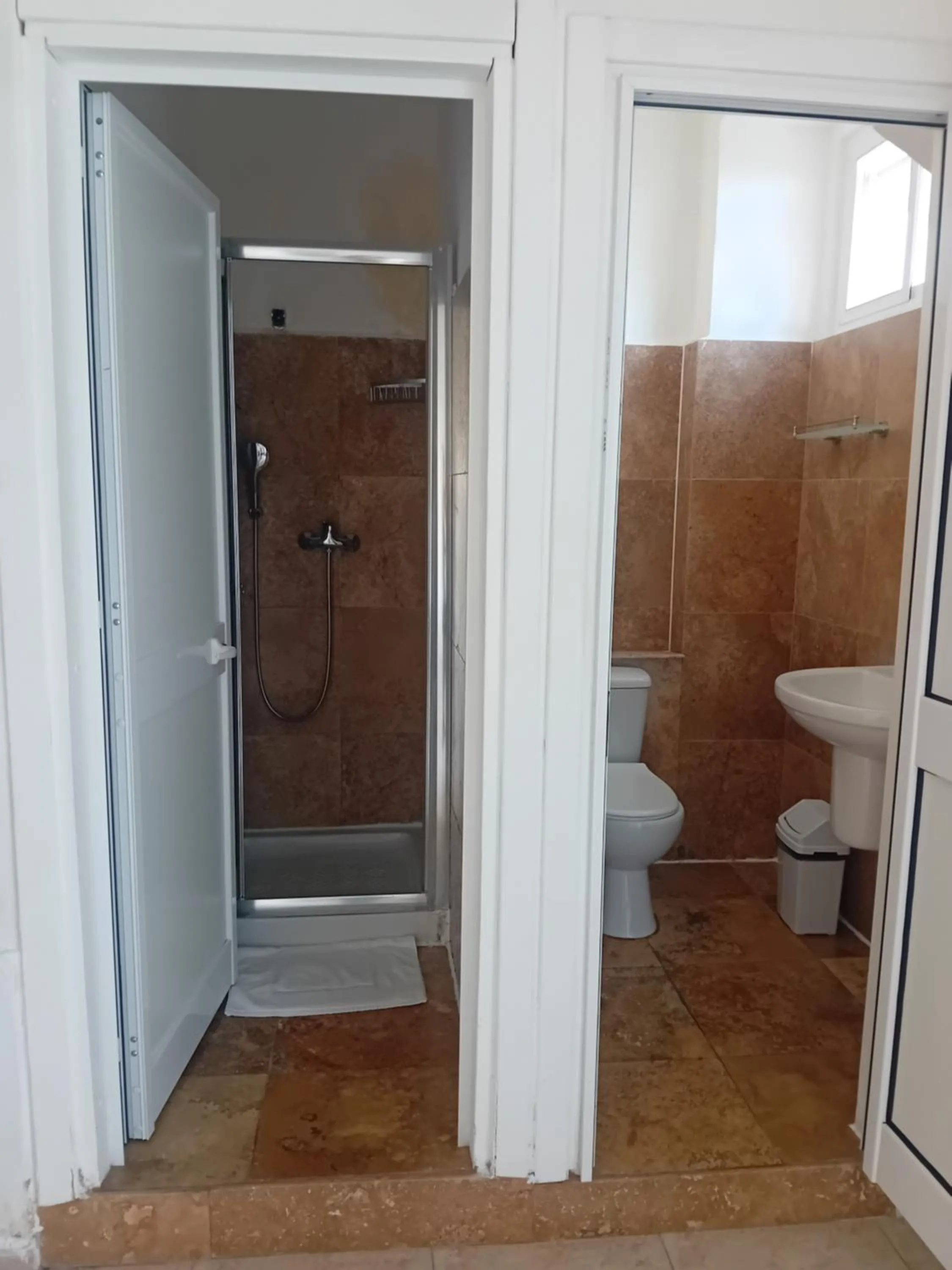 Shower in Follow the Sun Boutique Hostel - Pool, Breakfast & Sea Views