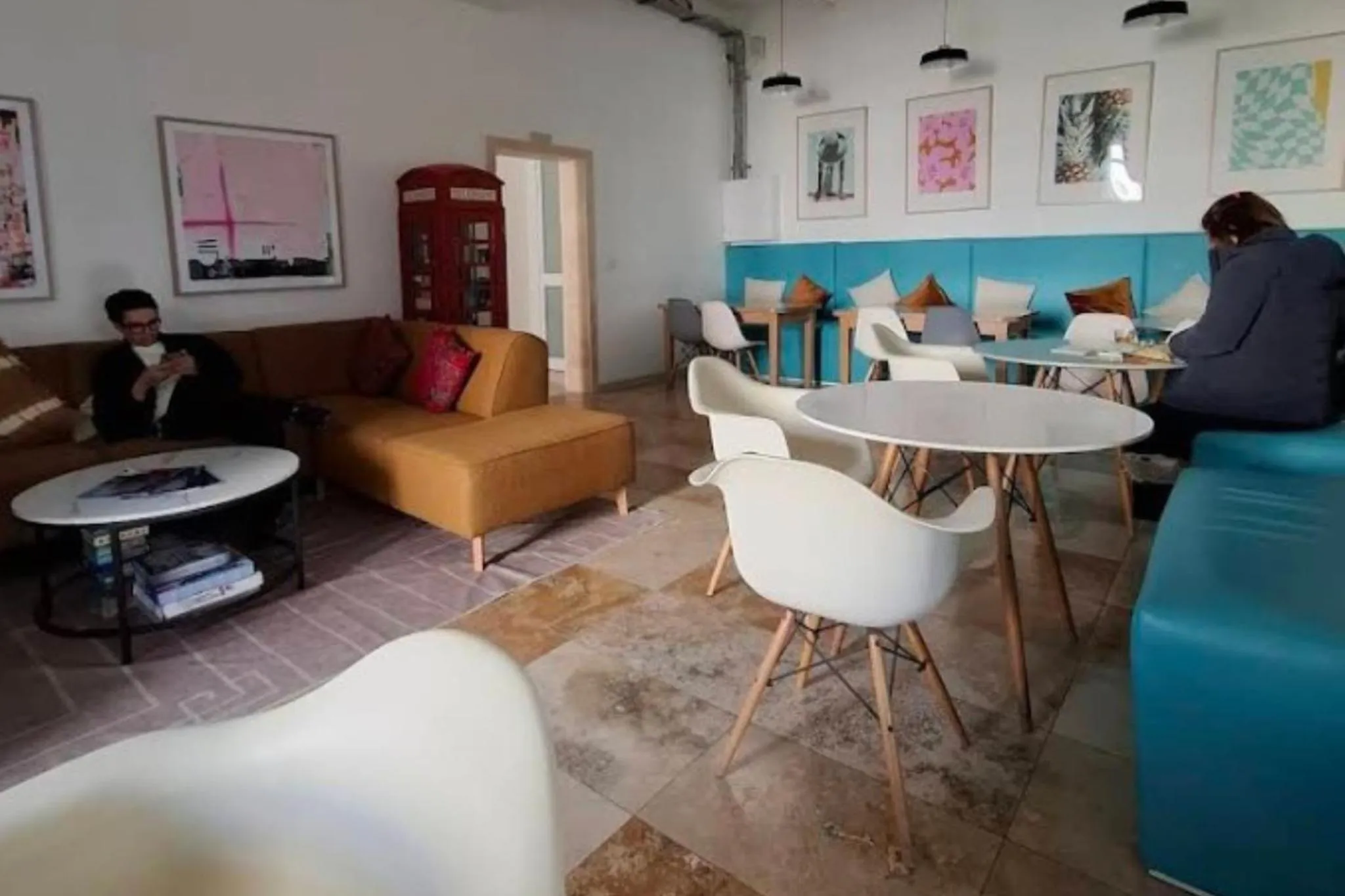 Living room in Follow the Sun Boutique Hostel - Pool, Breakfast & Sea Views