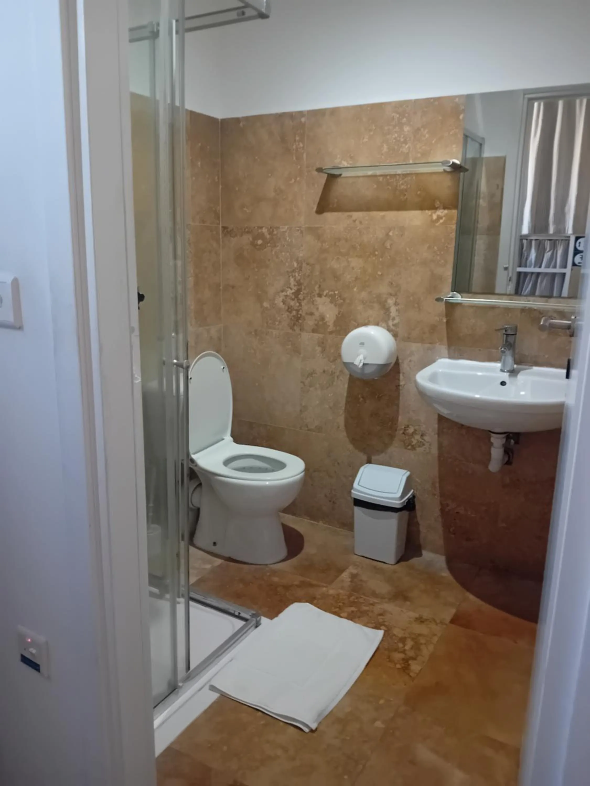 Shower in Follow the Sun Boutique Hostel - Pool, Breakfast & Sea Views