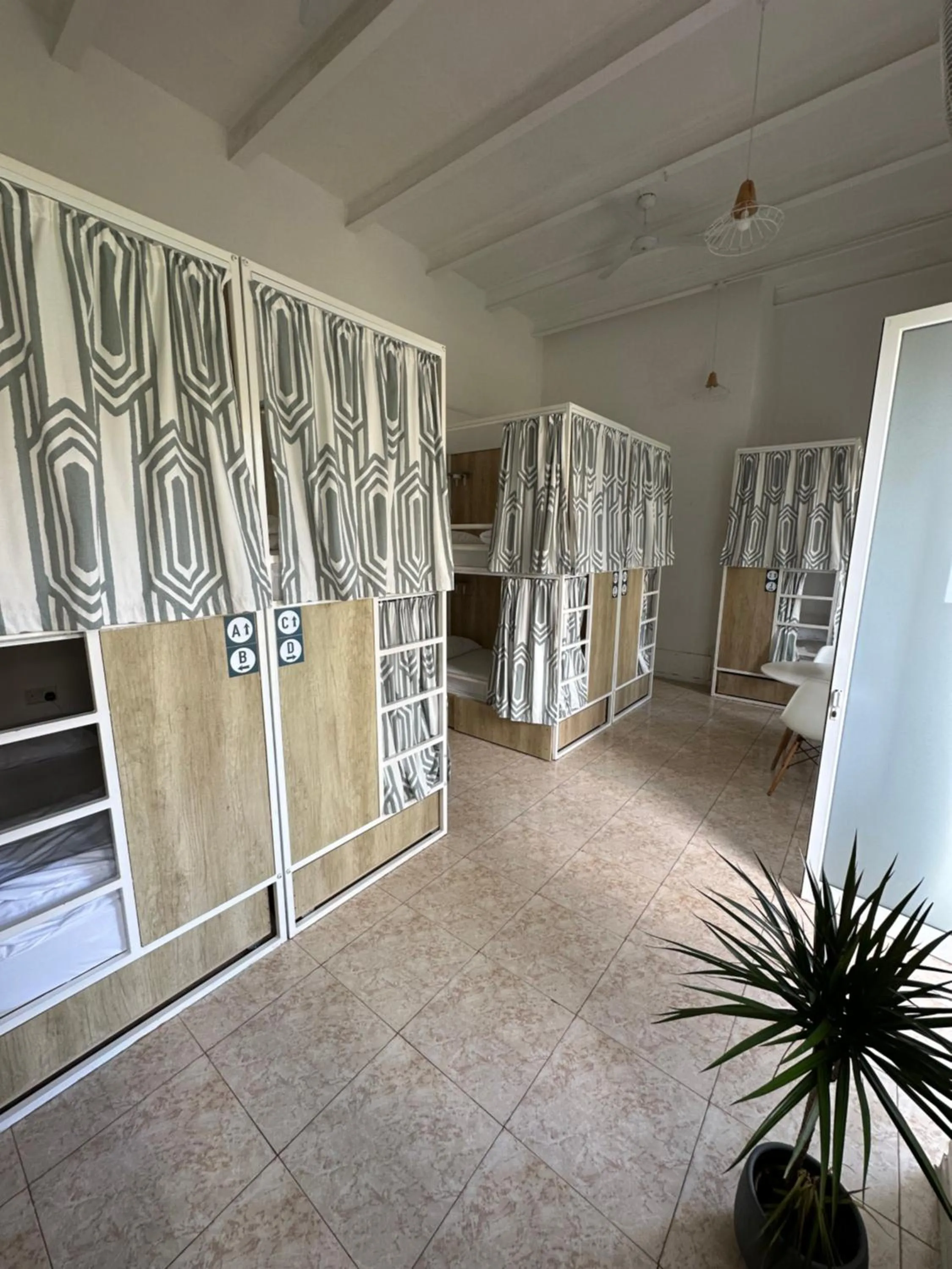 Bedroom in Follow the Sun Boutique Hostel - Pool, Breakfast & Sea Views