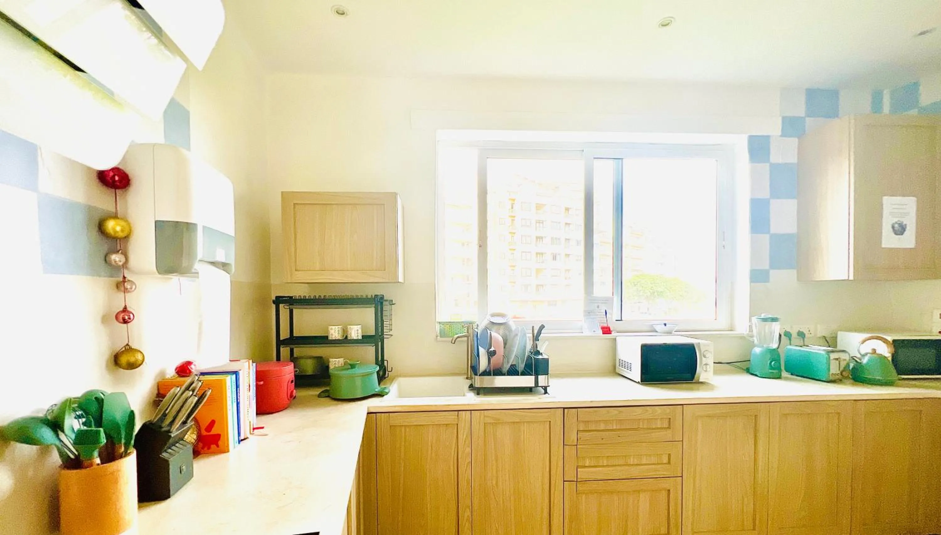 Kitchen or kitchenette in Follow the Sun Boutique Hostel - Pool, Breakfast & Sea Views