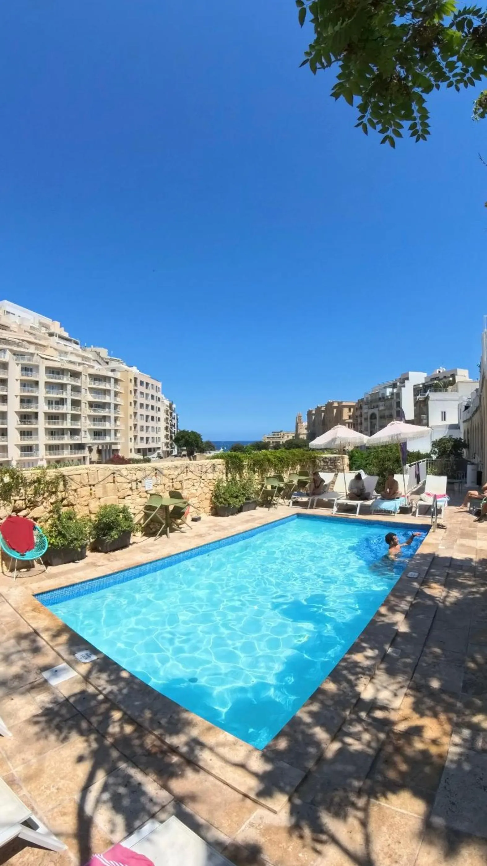 Property building in Follow the Sun Boutique Hostel - Pool, Breakfast & Sea Views