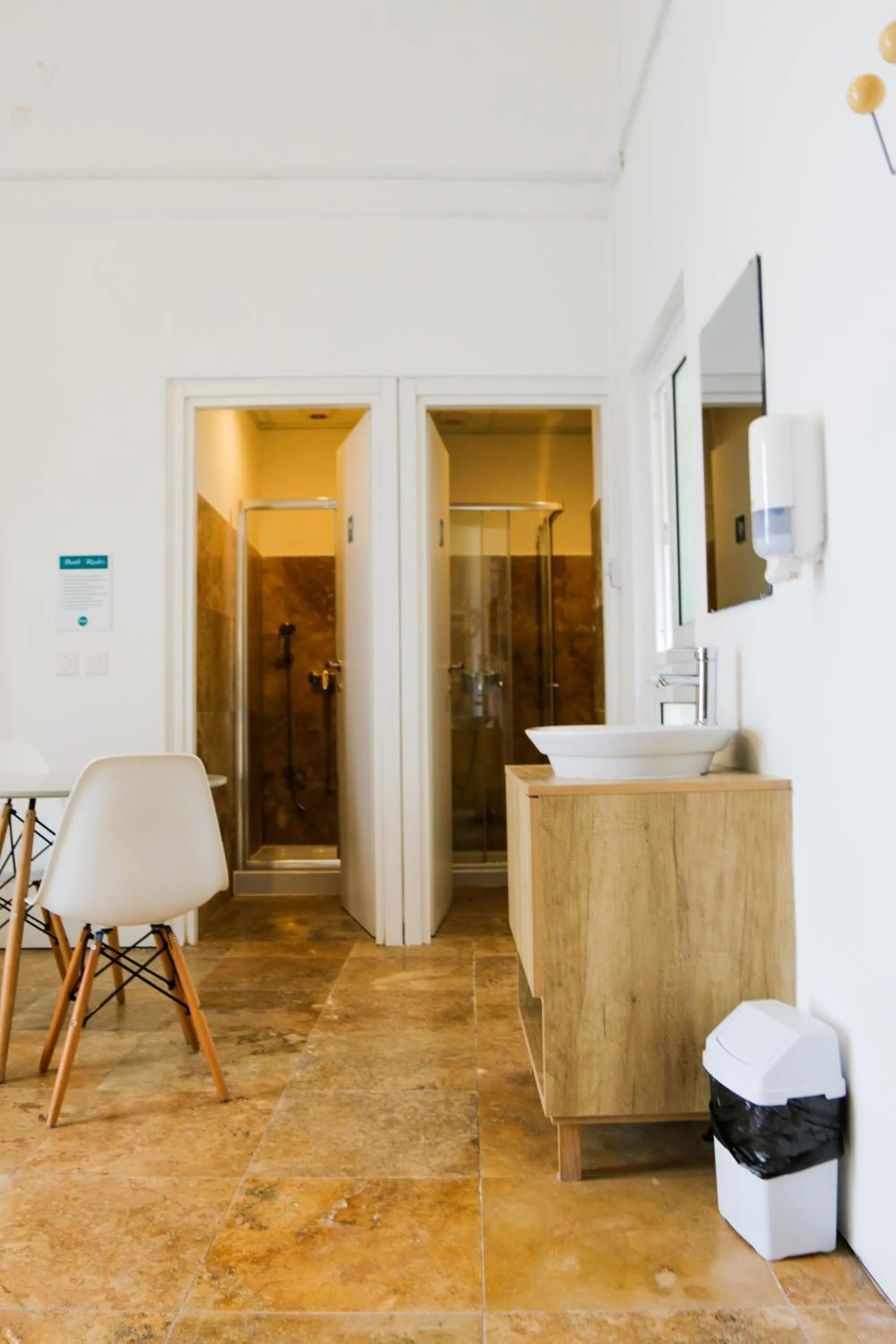 Bathroom in Follow the Sun Boutique Hostel - Pool, Breakfast & Sea Views