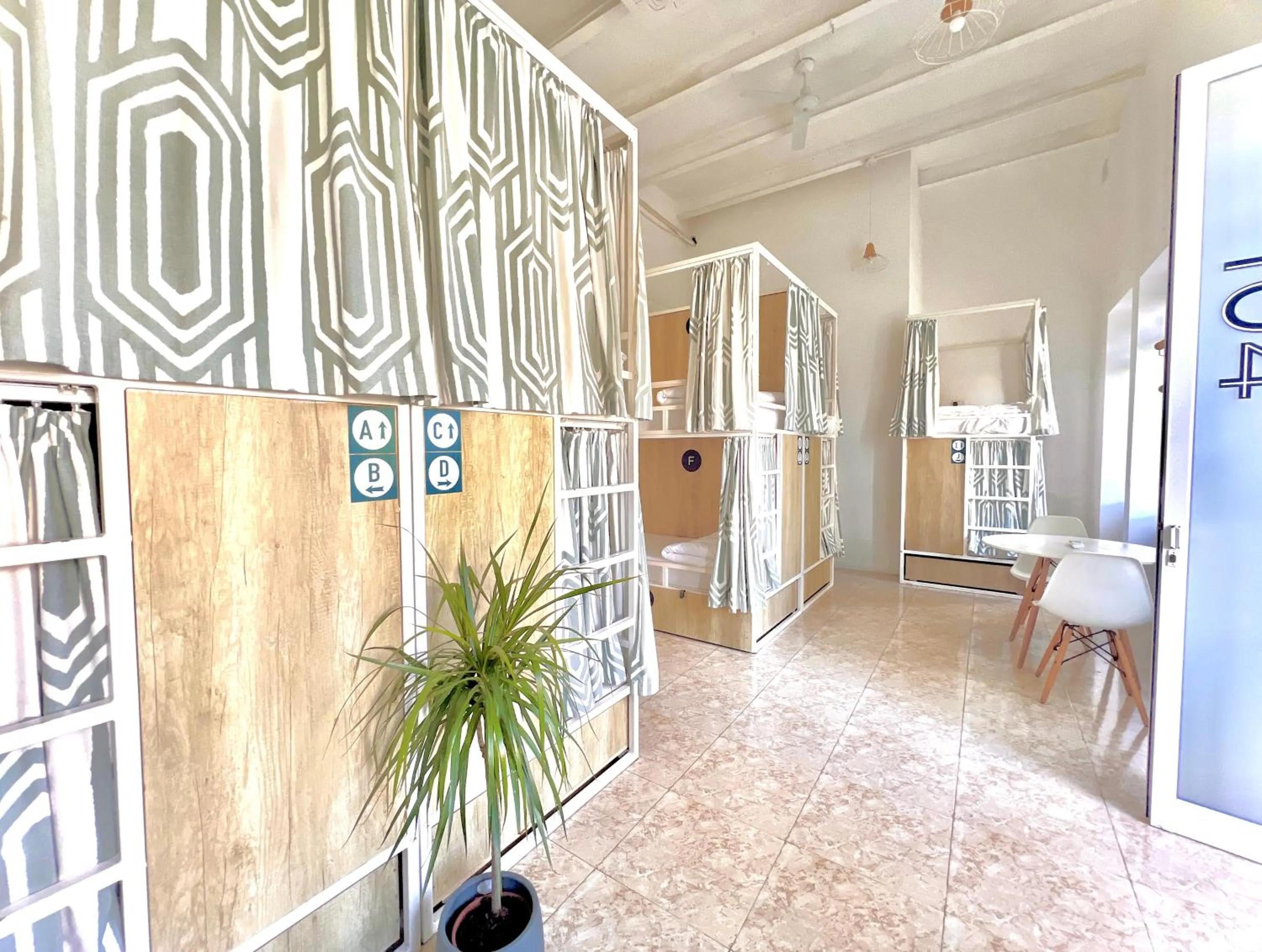 bunk bed in Follow the Sun Boutique Hostel - Pool, Breakfast & Sea Views