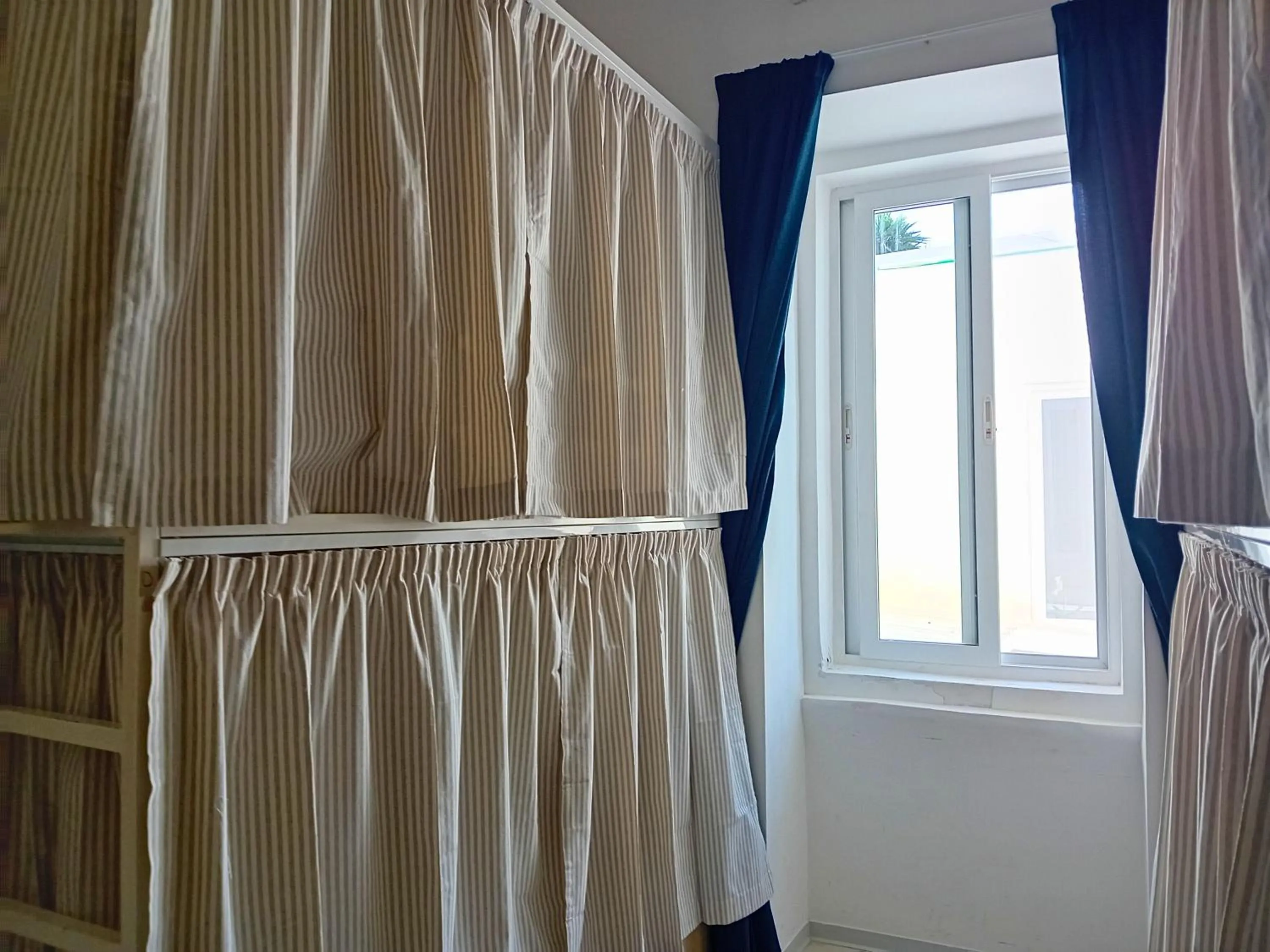 Bed in Follow the Sun Boutique Hostel - Pool, Breakfast & Sea Views