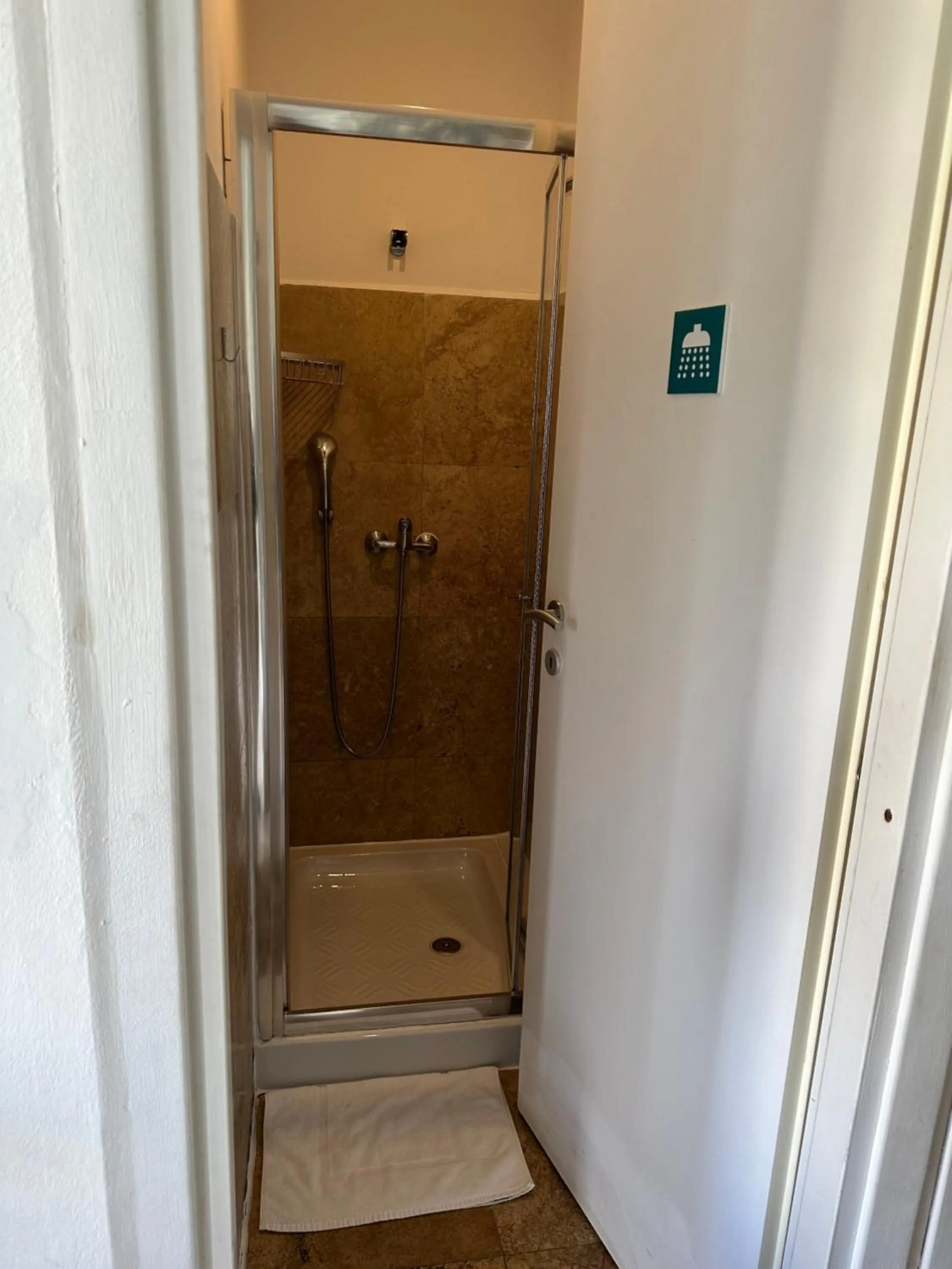 Shower in Follow the Sun Boutique Hostel - Pool, Breakfast & Sea Views