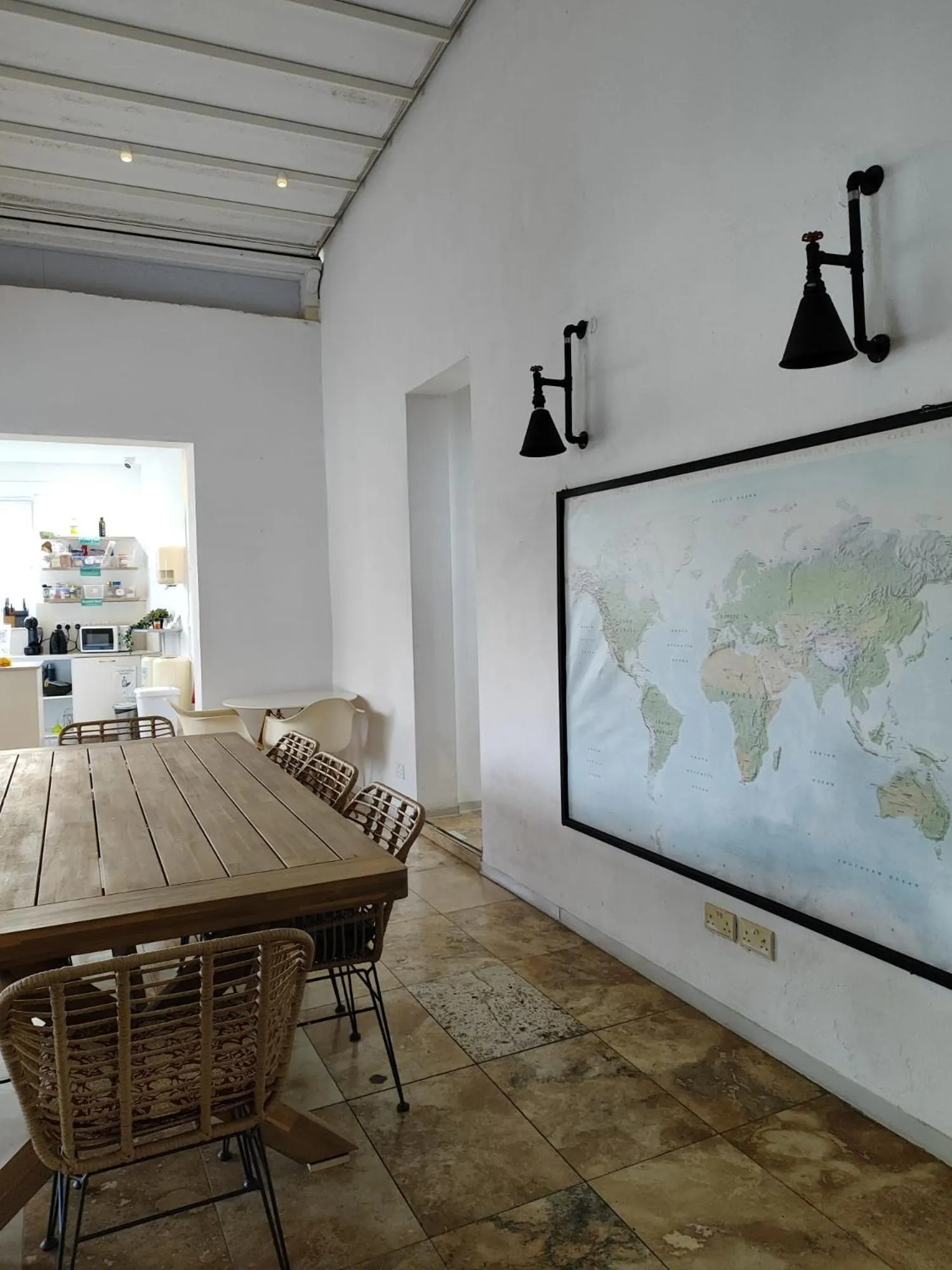 Communal lounge/ TV room in Follow the Sun Boutique Hostel - Pool, Breakfast & Sea Views