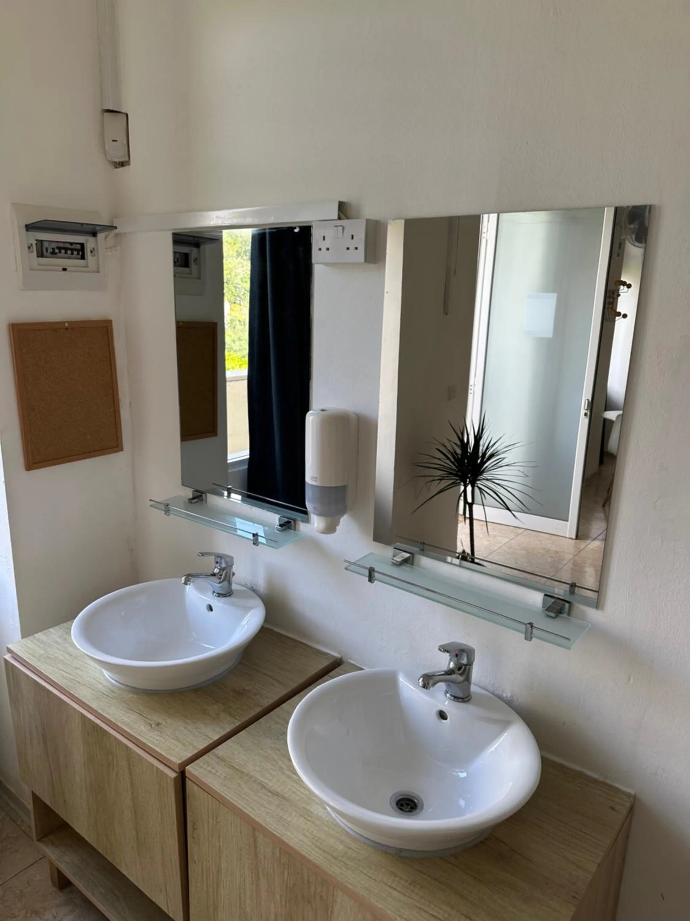 Bathroom in Follow the Sun Boutique Hostel - Pool, Breakfast & Sea Views