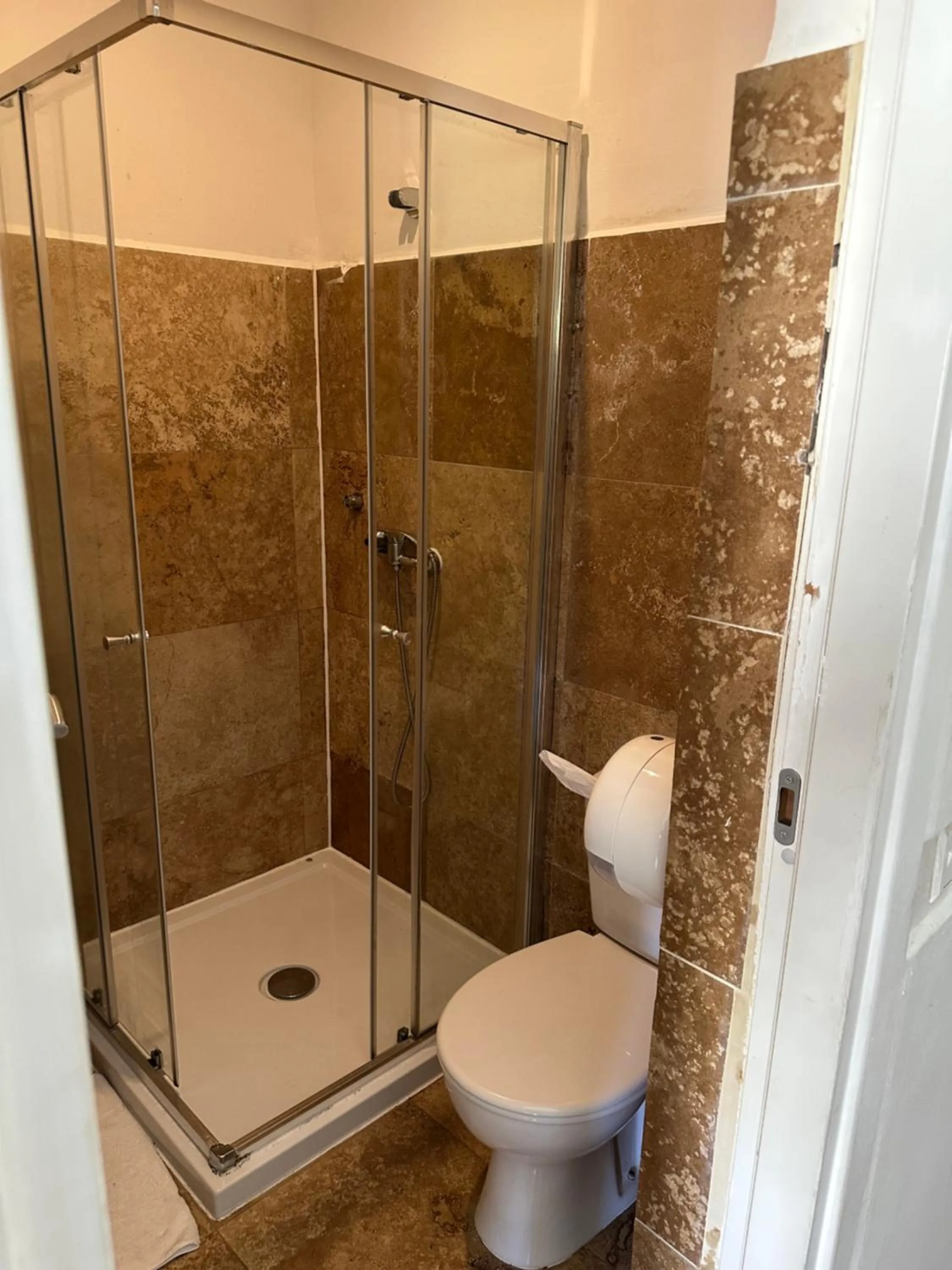 Toilet in Follow the Sun Boutique Hostel - Pool, Breakfast & Sea Views