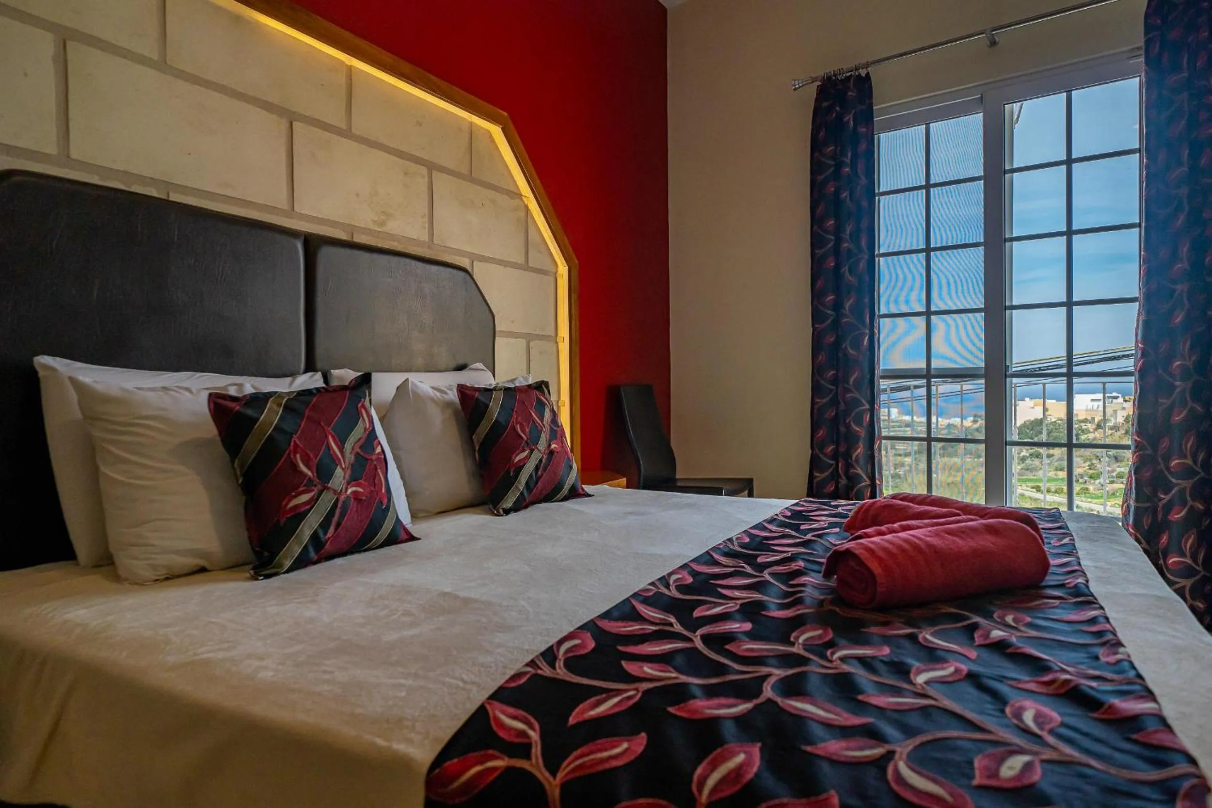 Bed in Il-Logga Boutique Hotel