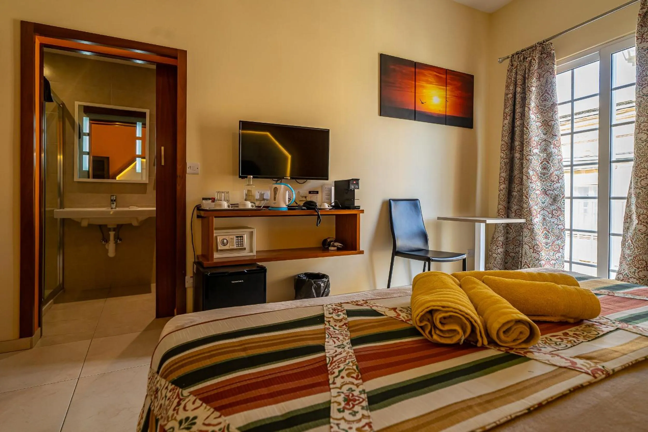 Bed in Il-Logga Boutique Hotel