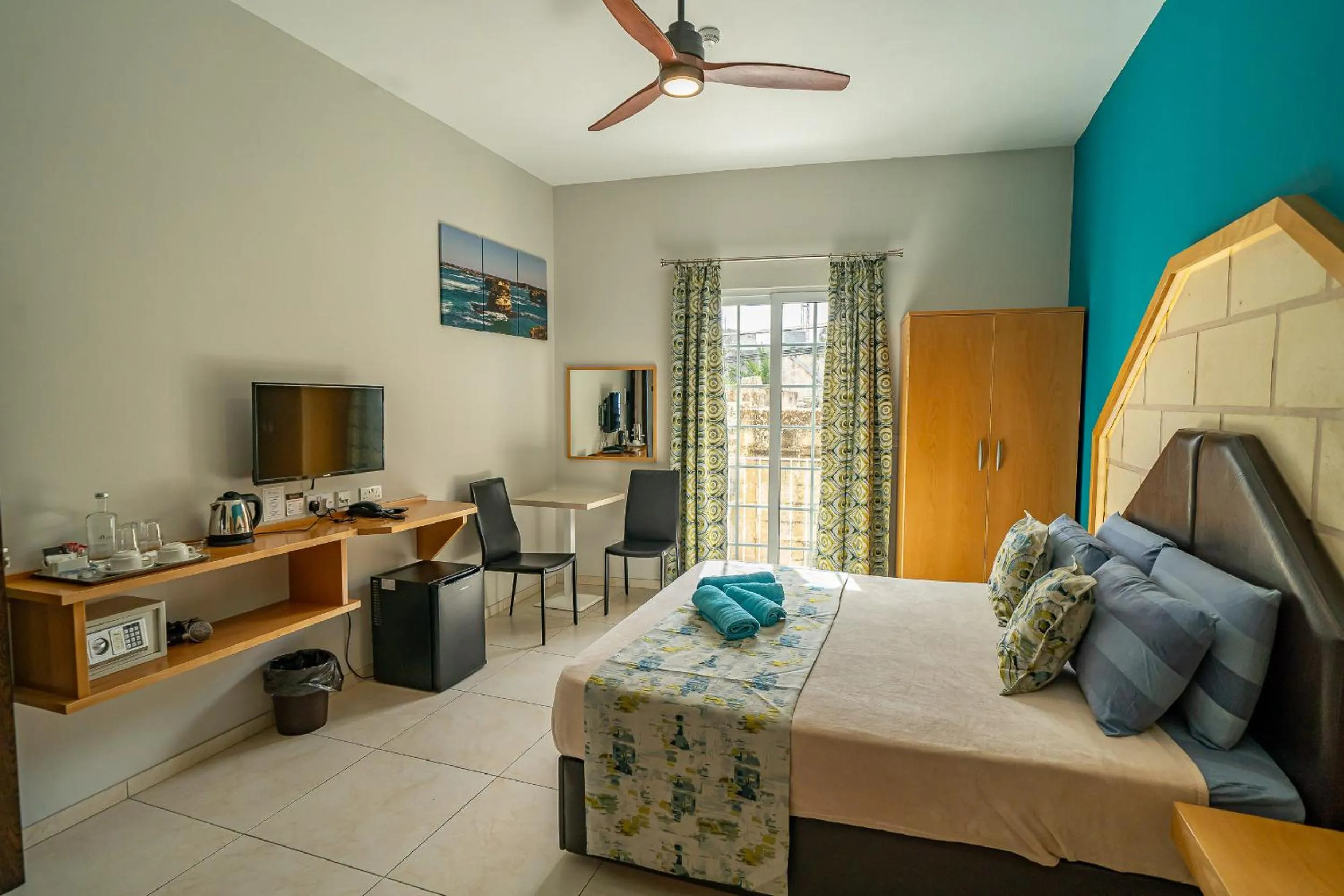 Bed in Il-Logga Boutique Hotel