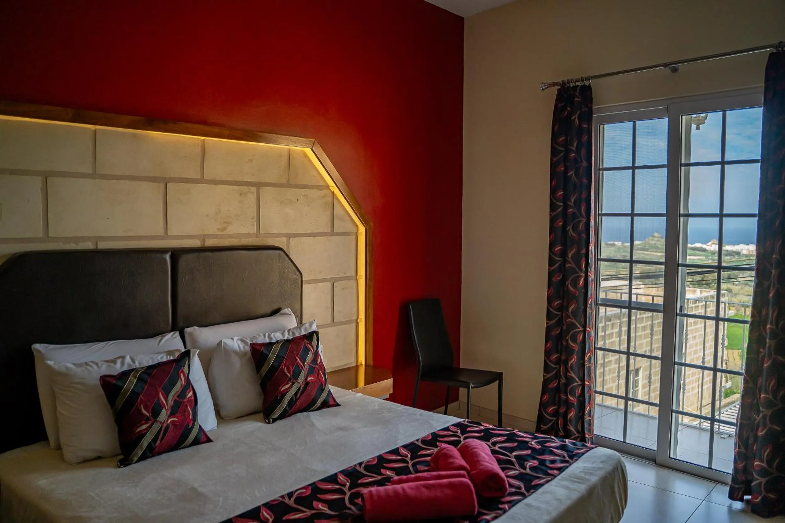 Bed in Il-Logga Boutique Hotel