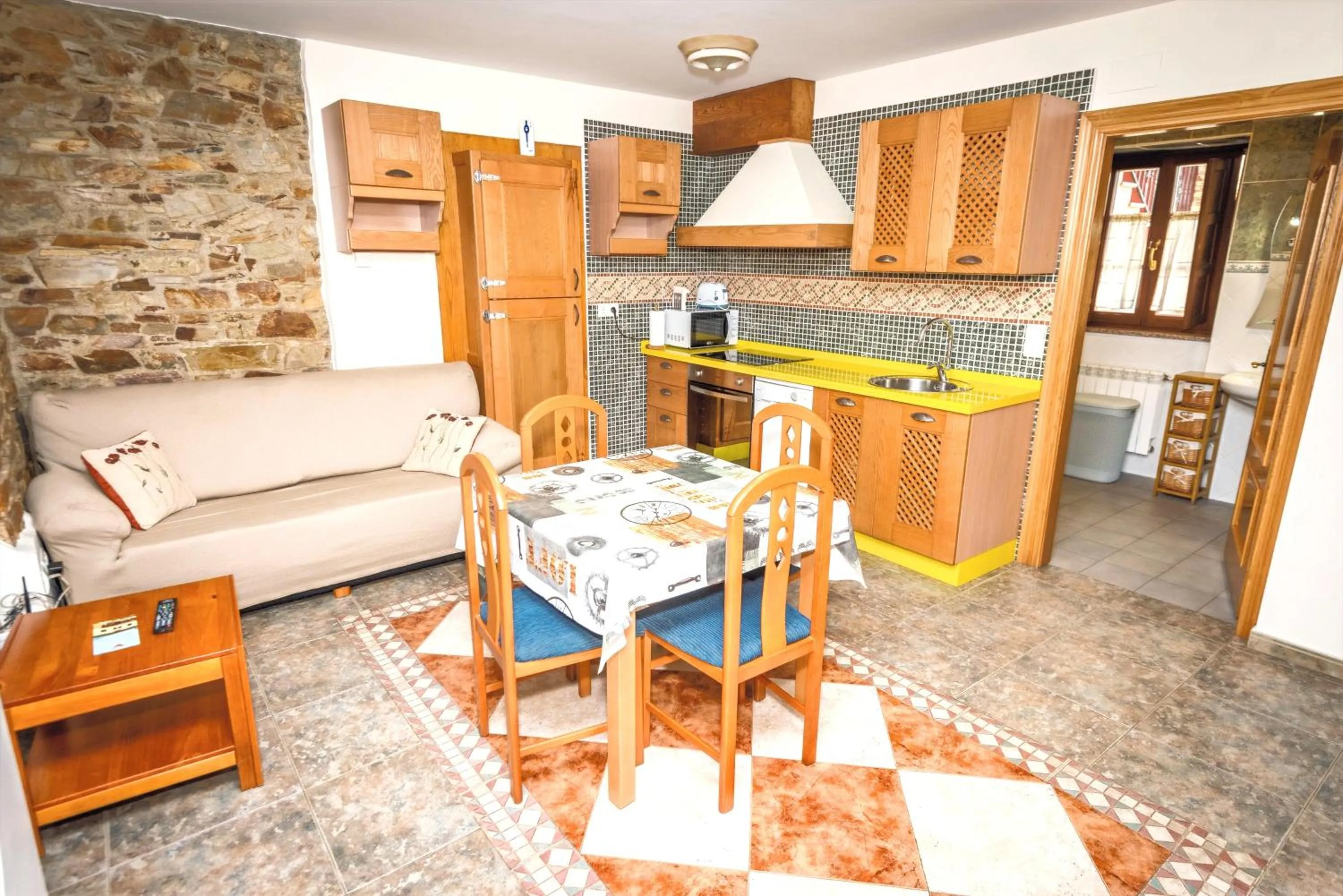 Kitchen or kitchenette in Apartamentos Navalin