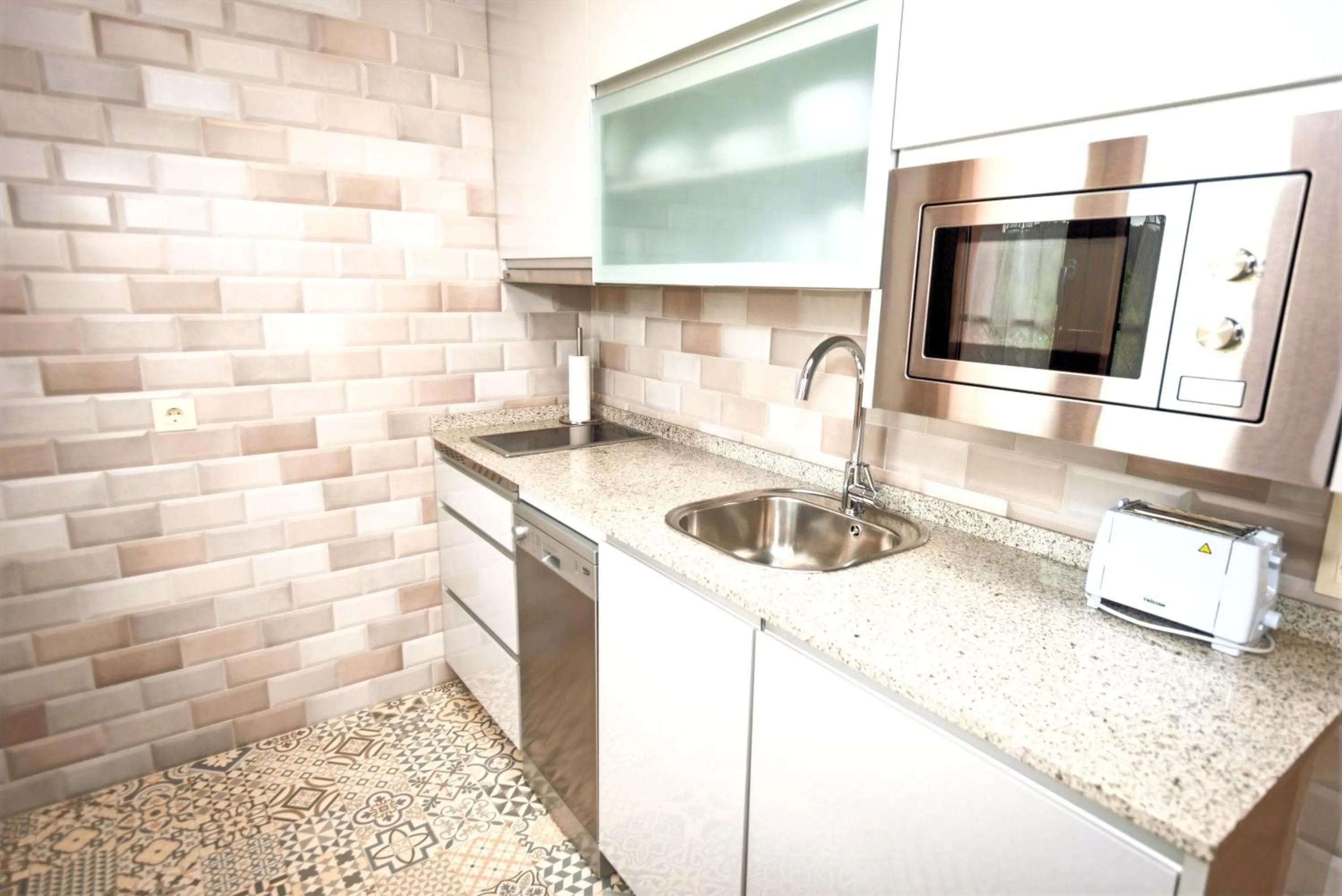 Kitchen or kitchenette in Apartamentos Navalin