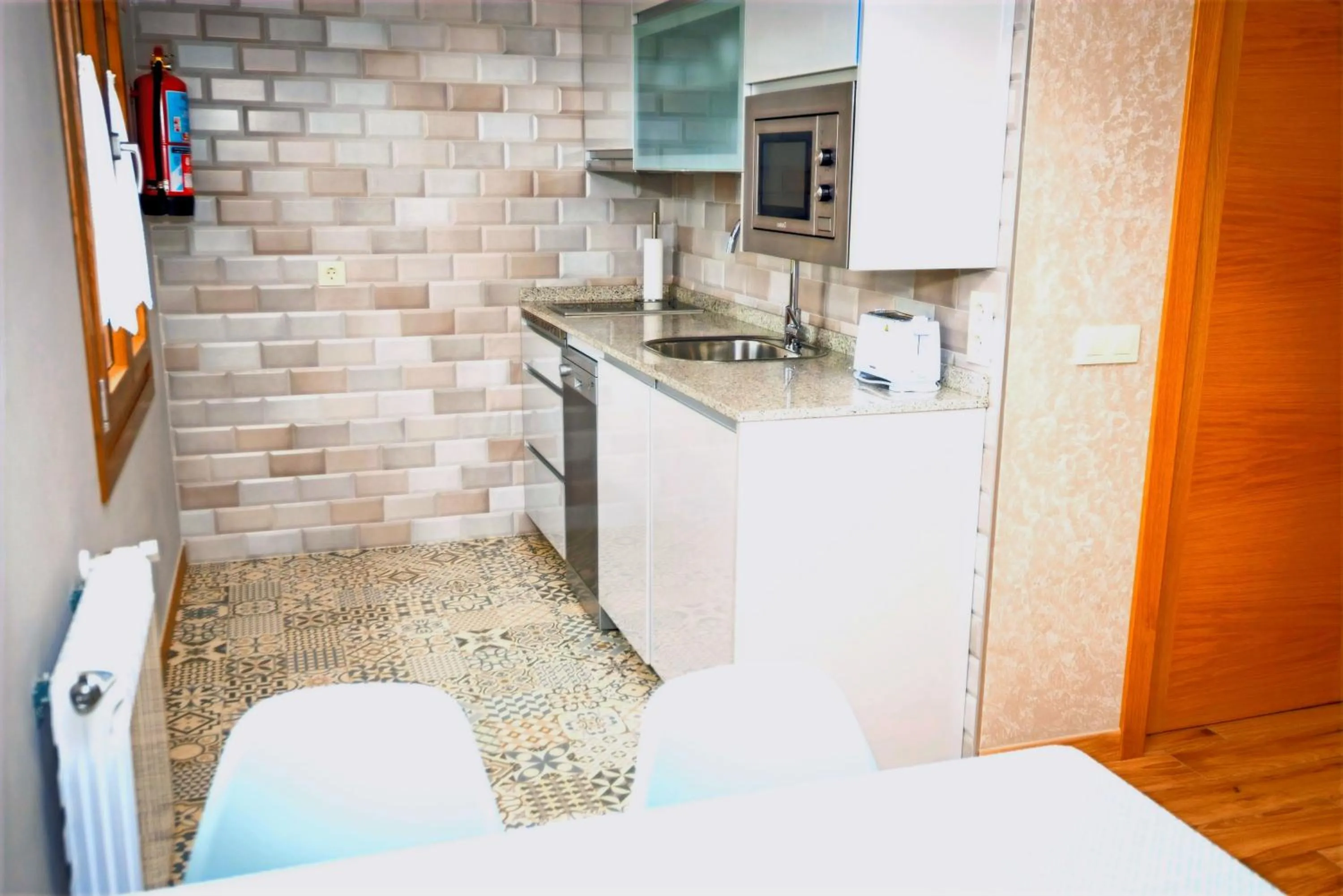 kitchen in Apartamentos Navalin