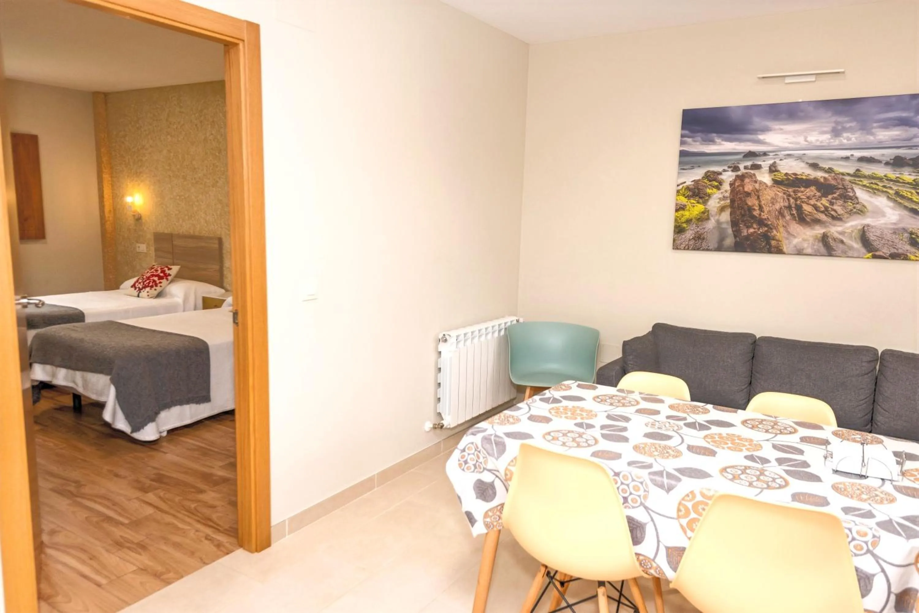 Dining area, Bed in Apartamentos Navalin