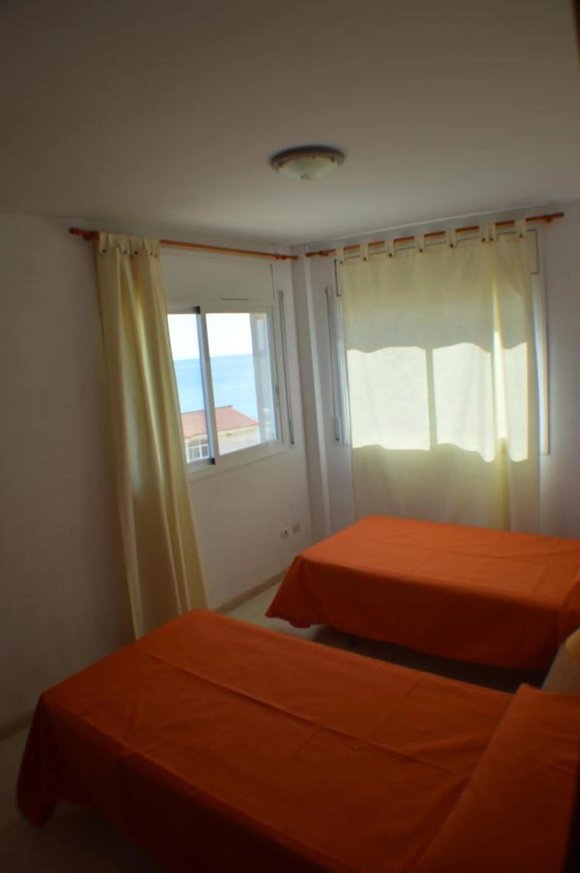 Bed in JOYAPARTMENTS Calas II