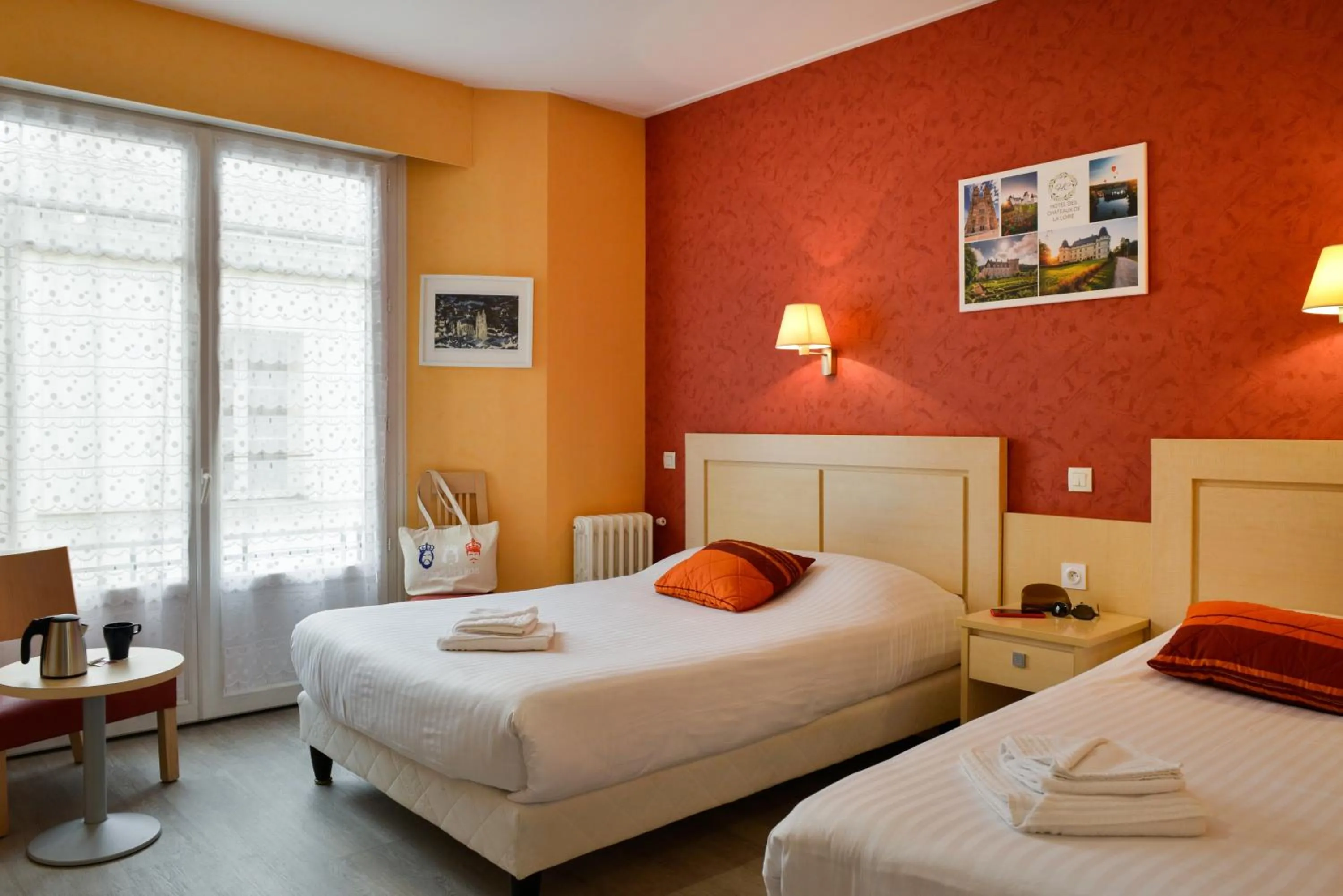 Photo of the whole room, Bed in Logis Hôtel Des Châteaux De La Loire