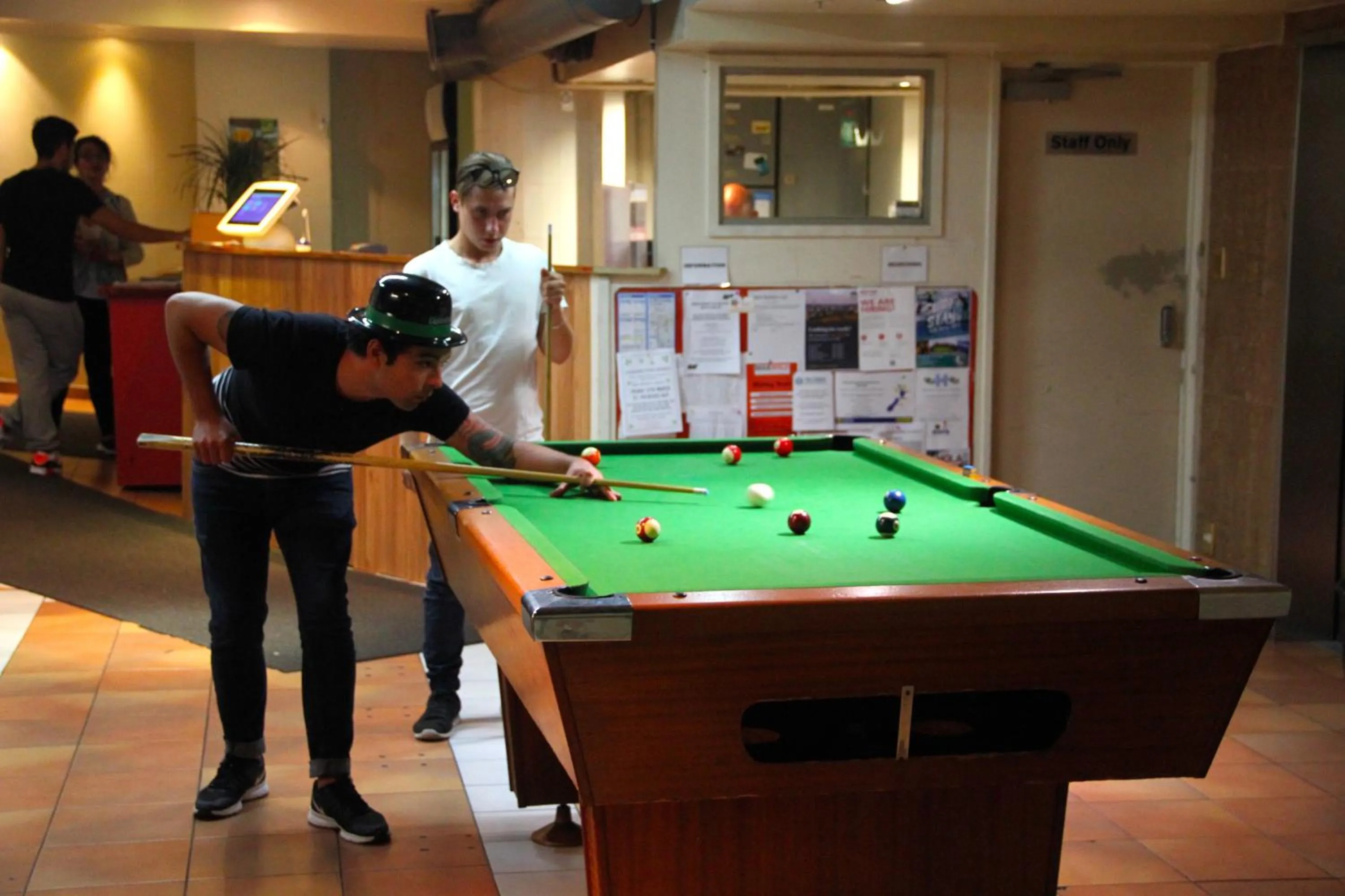 Communal lounge/ TV room in Choice Backpackers