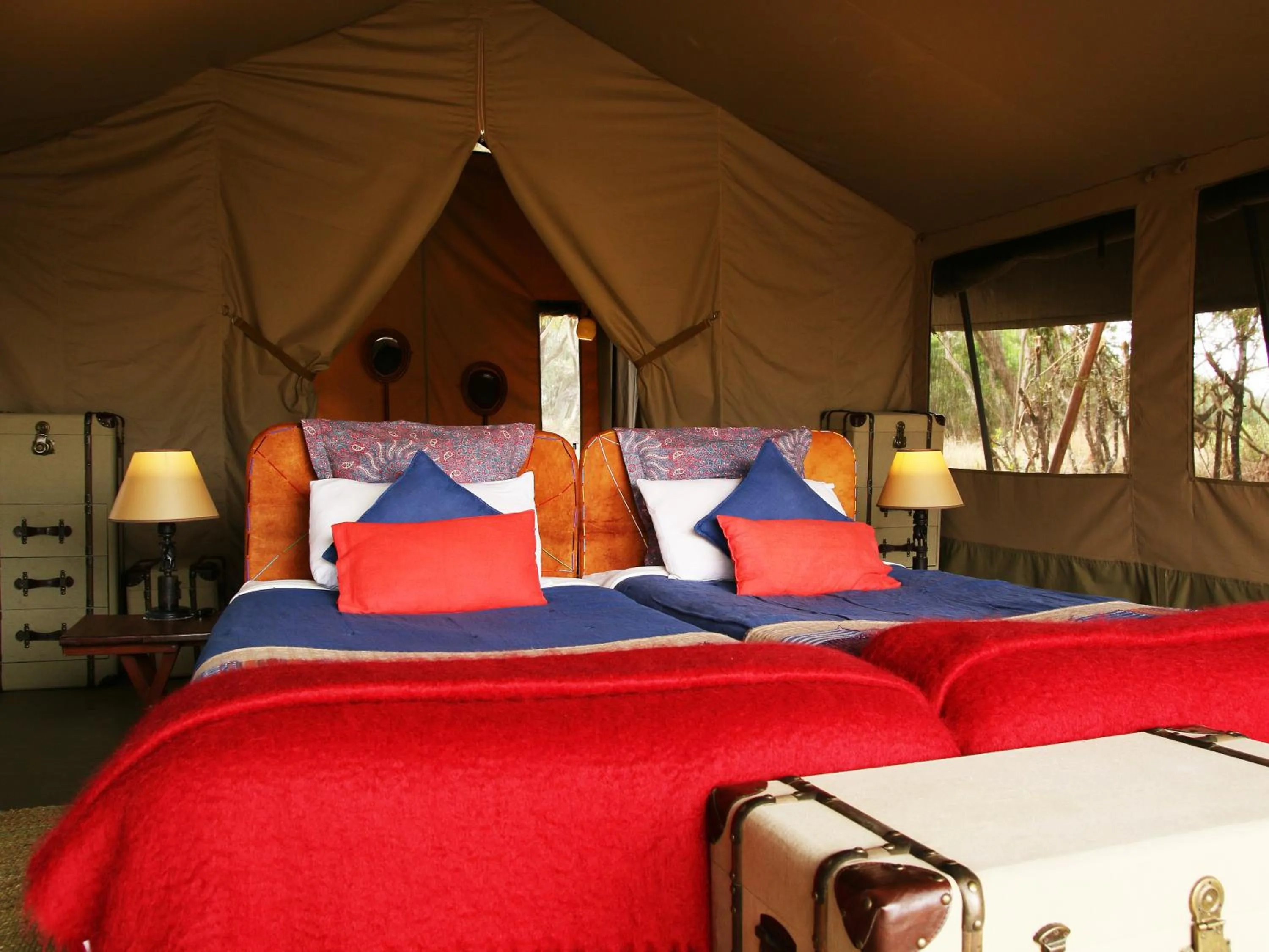Bed in Olengoti Eco Safari Camp